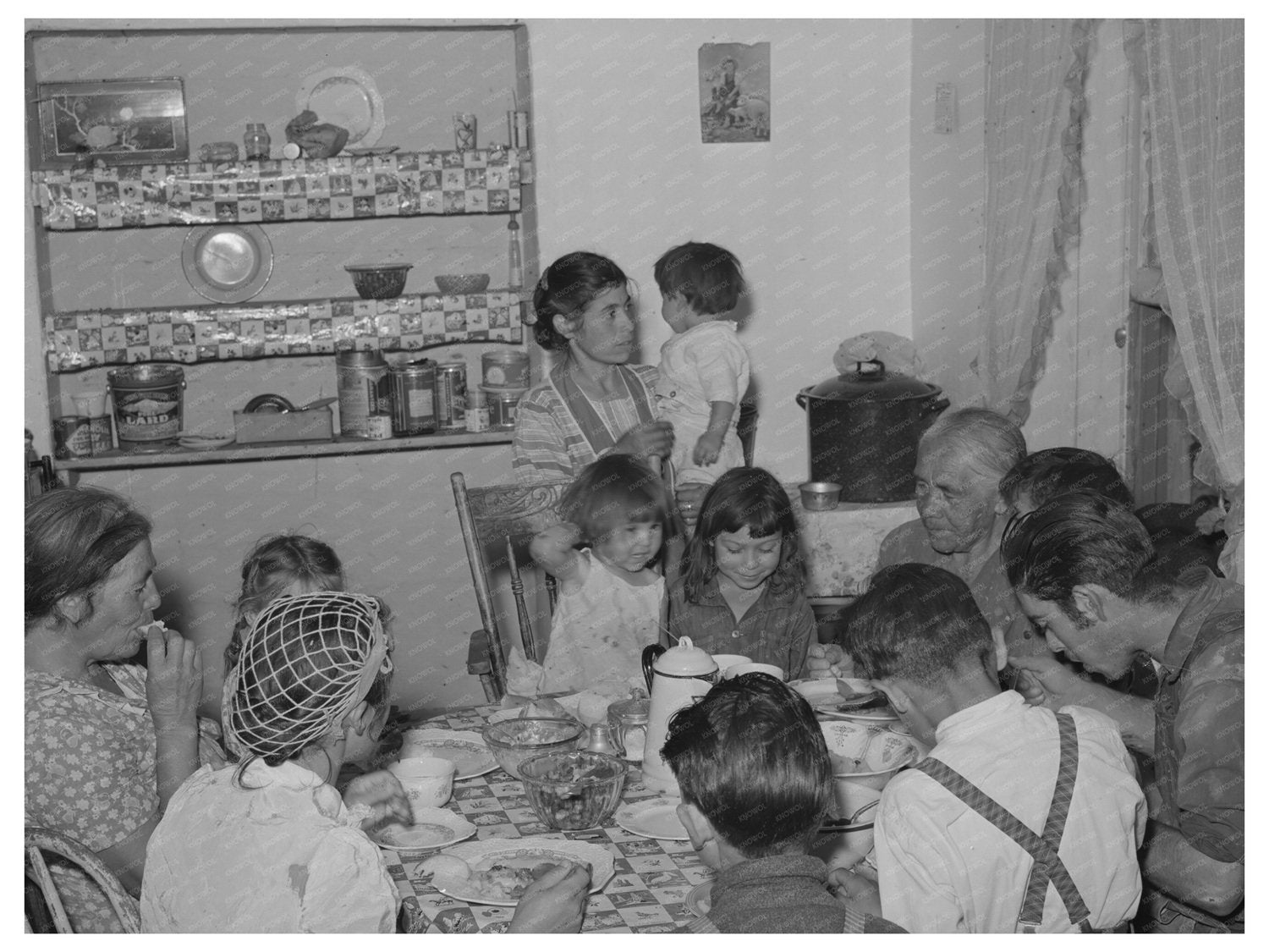Spanish-American Family Dining in Chamisal New Mexico 1940