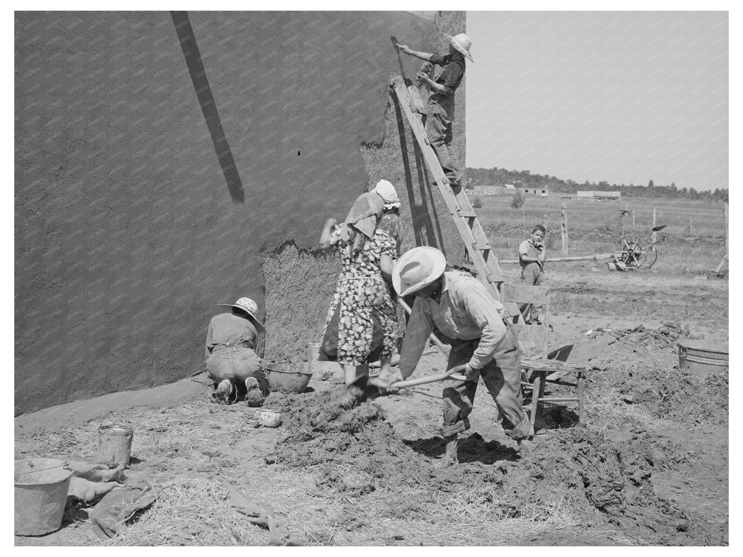 Women Plastering a House in Chamisal New Mexico 1940