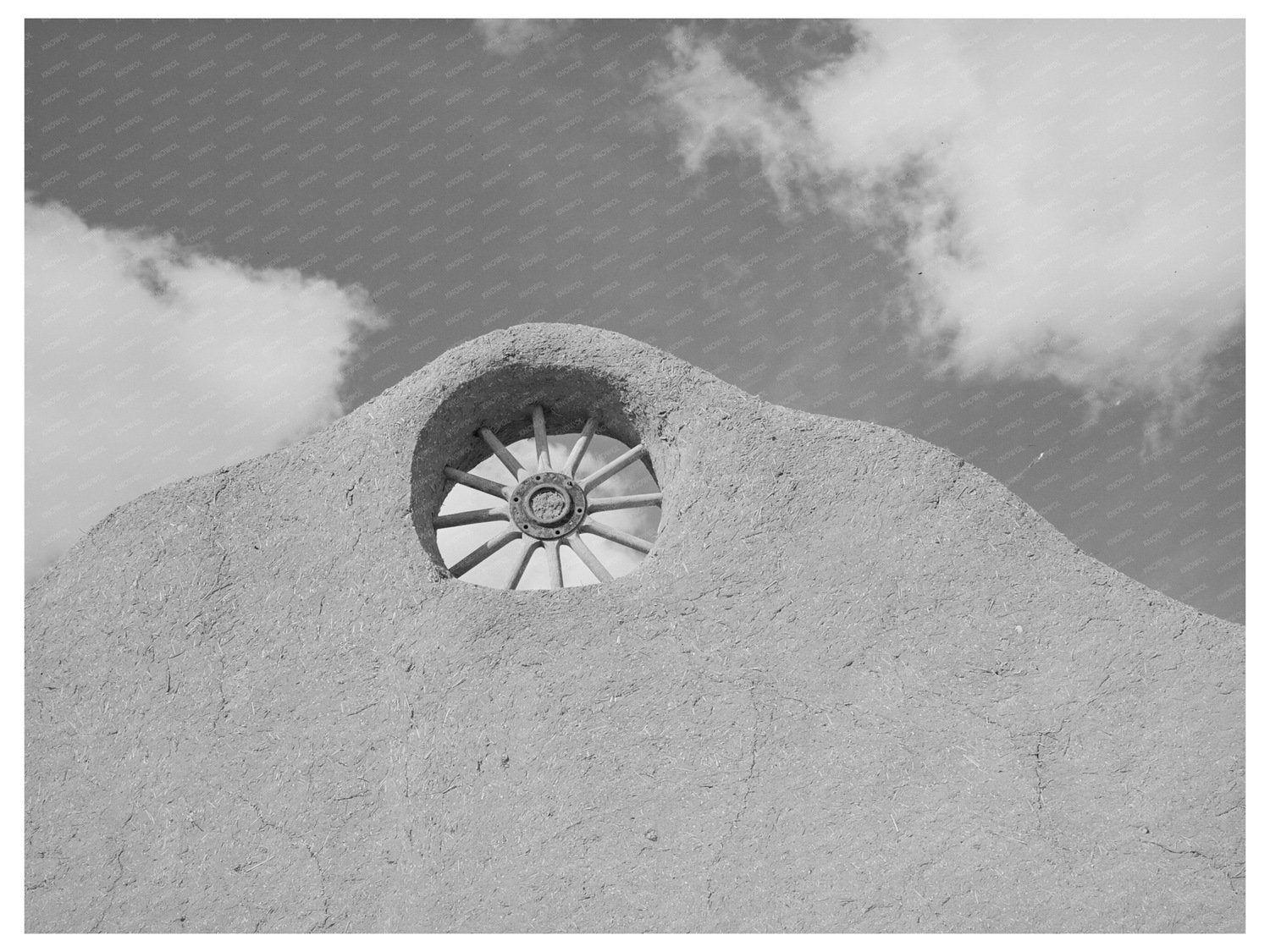 Vintage Wagon Wheel in Adobe House Penasco New Mexico 1940