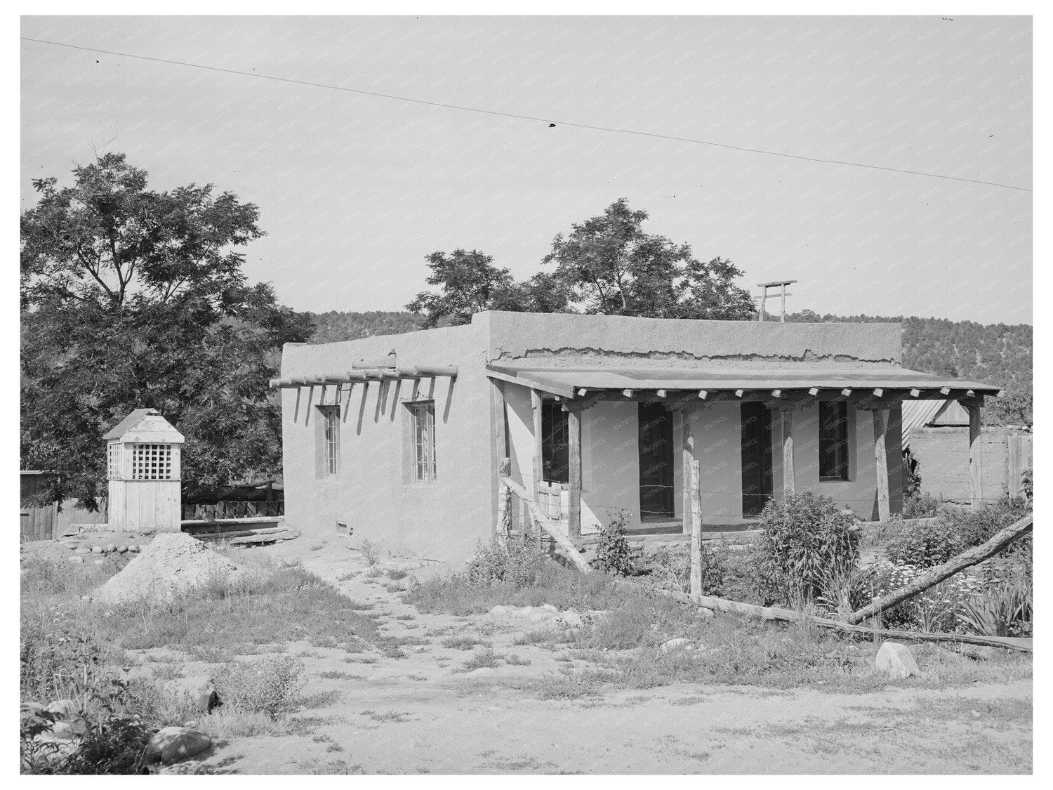 Adobe House and Well in Penasco New Mexico 1940