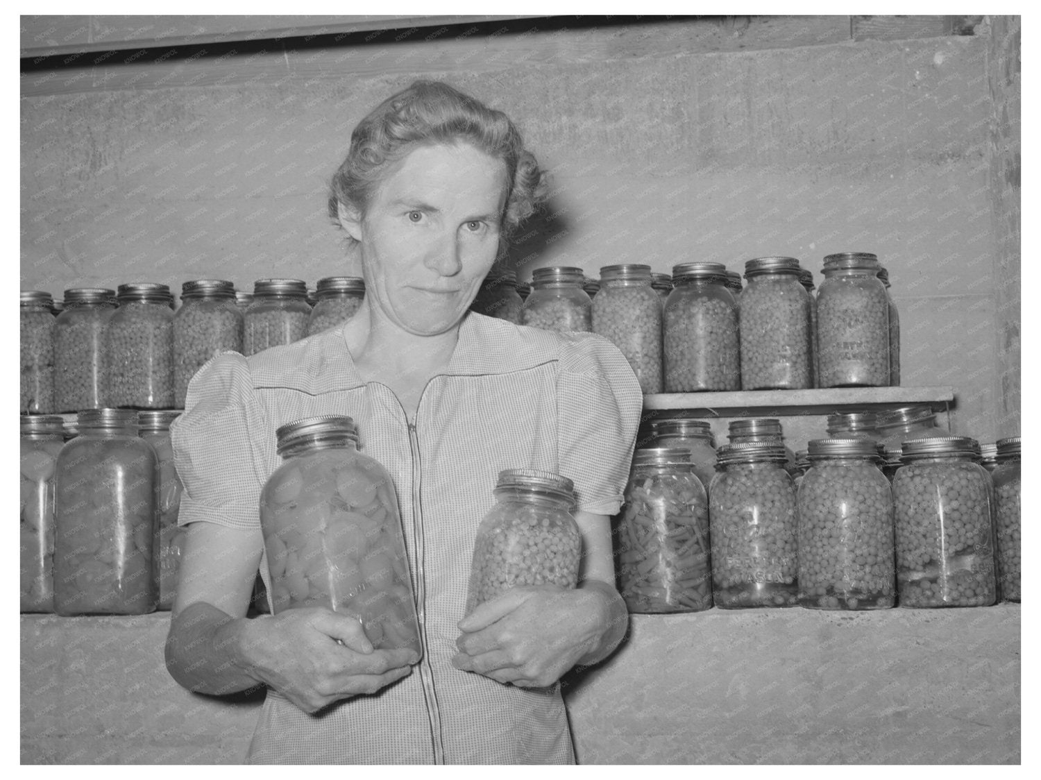 Mormon Farmers Wife with Canned Goods Snowville Utah 1940