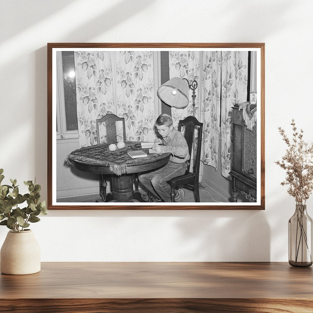 Son of Mr. Schmidt Doing Homework Tulare County 1940