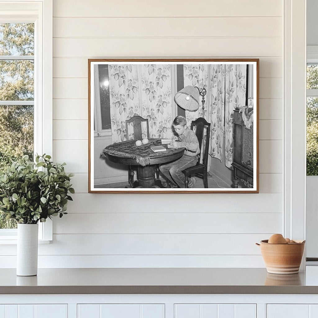 Son of Mr. Schmidt Doing Homework Tulare County 1940