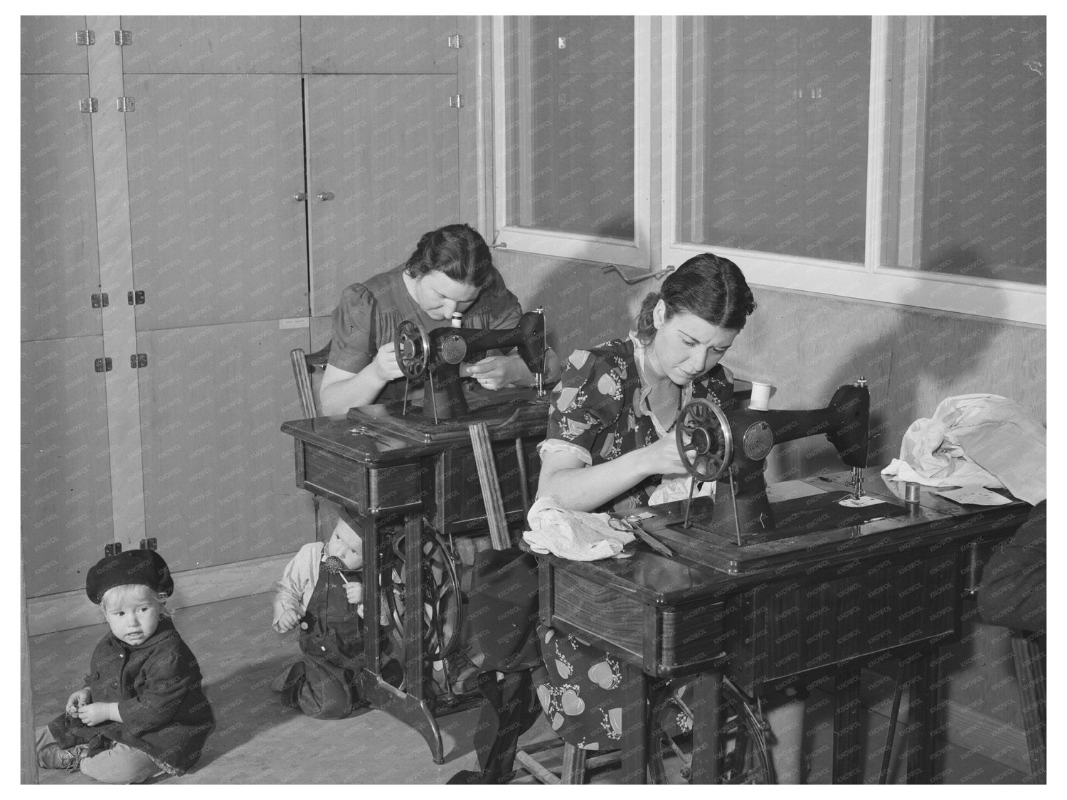 Wives of Farm Workers Sewing in Yuba City December 1940