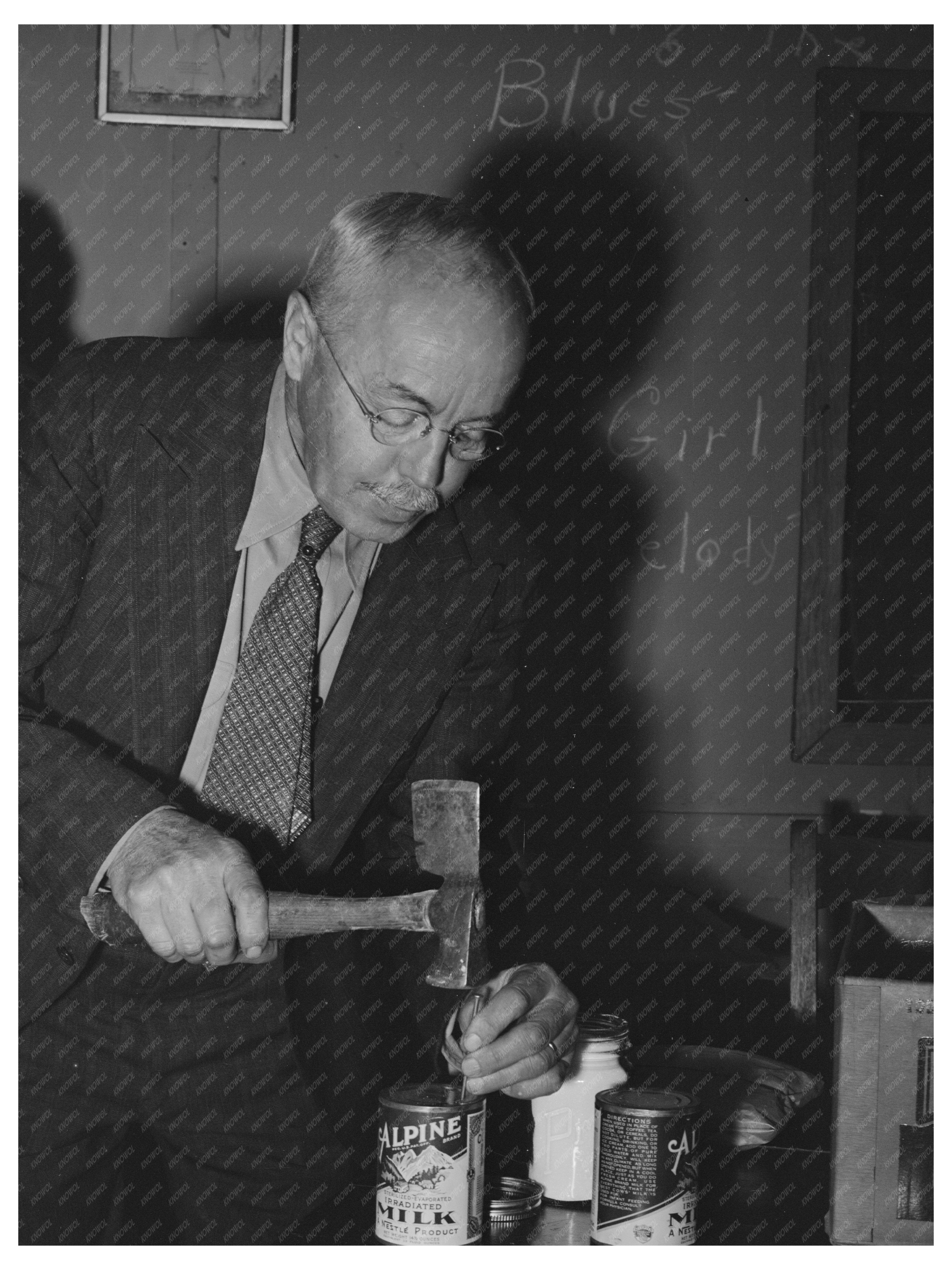 Farmer Opens Milk Can for Coffee at Meeting December 1940