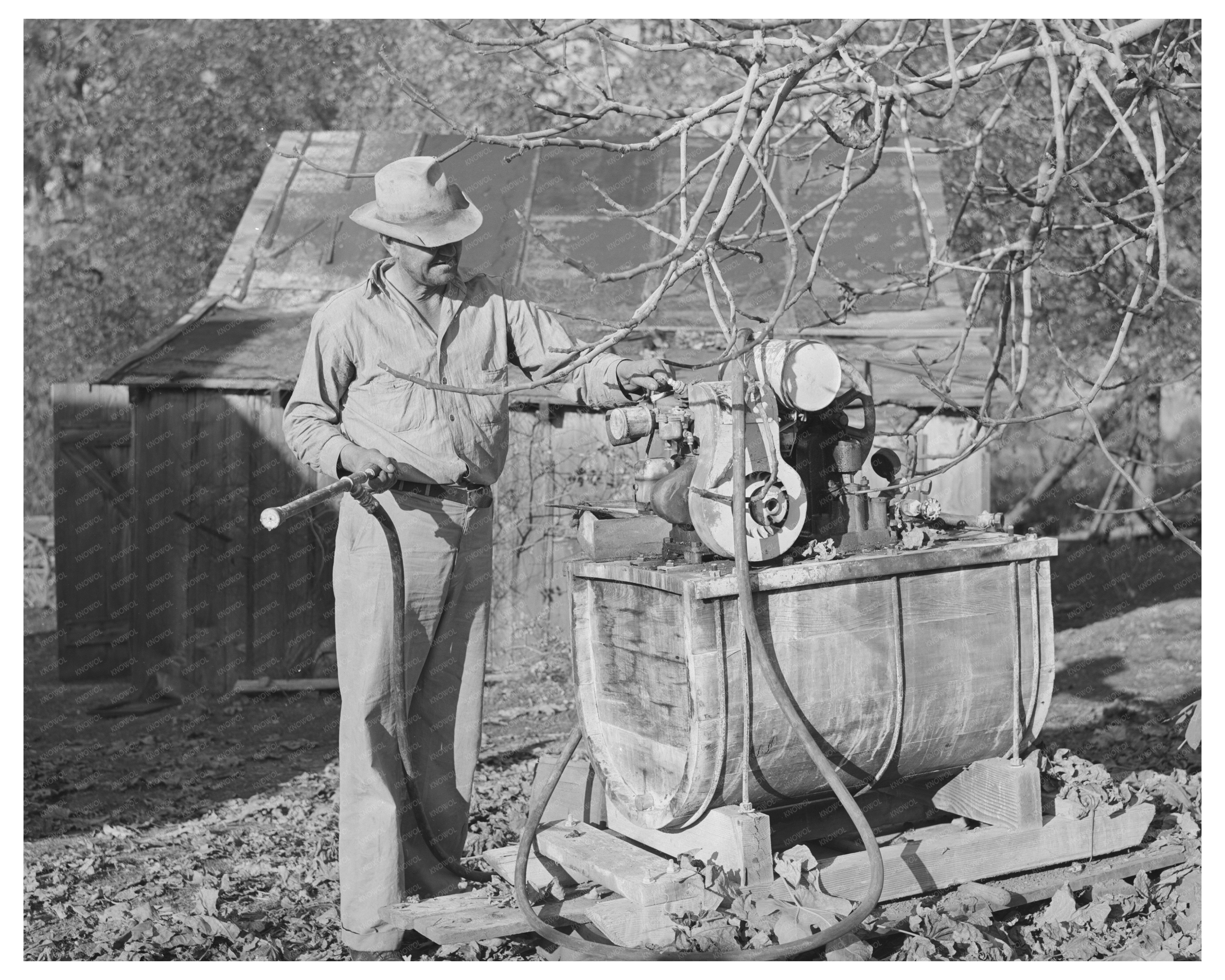 Oklahoma Farmer with Spraying Equipment December 1940