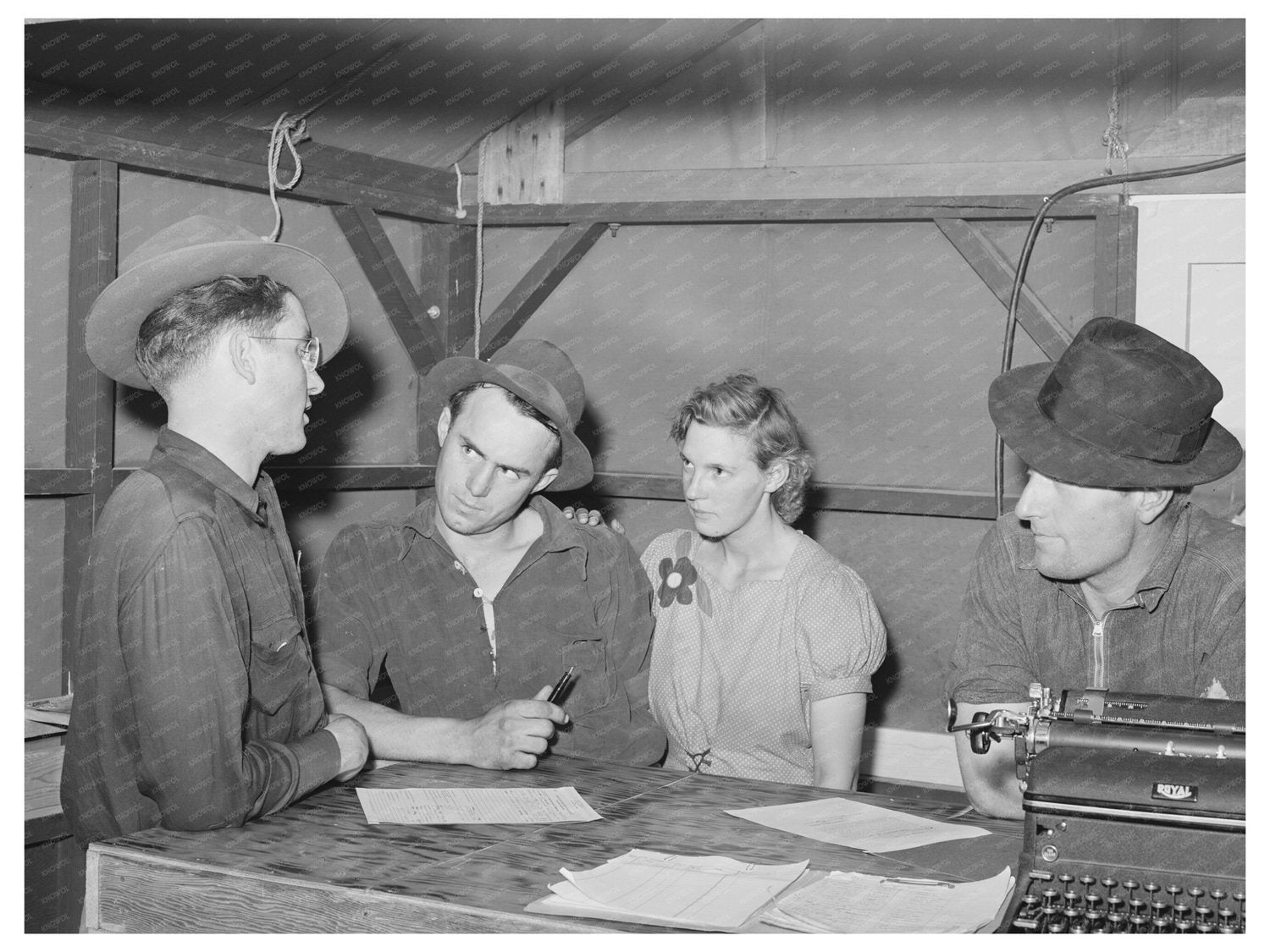 1941 Camp Manager Talks with Farm Workers in Wilder Idaho