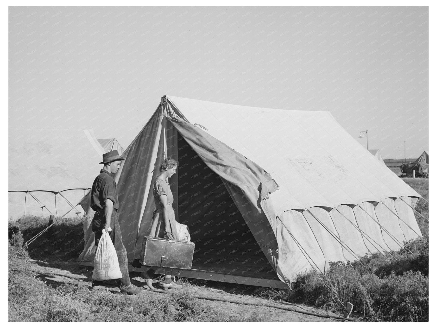 Farm Workers Moving into Tent at Idaho Labor Camp 1944