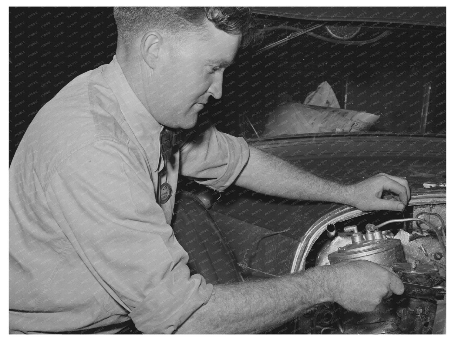 Workman Assembles Diesel-Powered Car June 1941