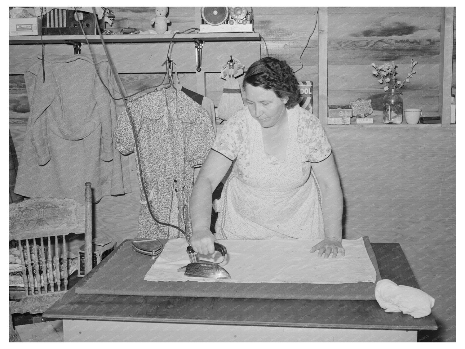 1941 Woman Ironing in Farm Labor Camp Caldwell Idaho