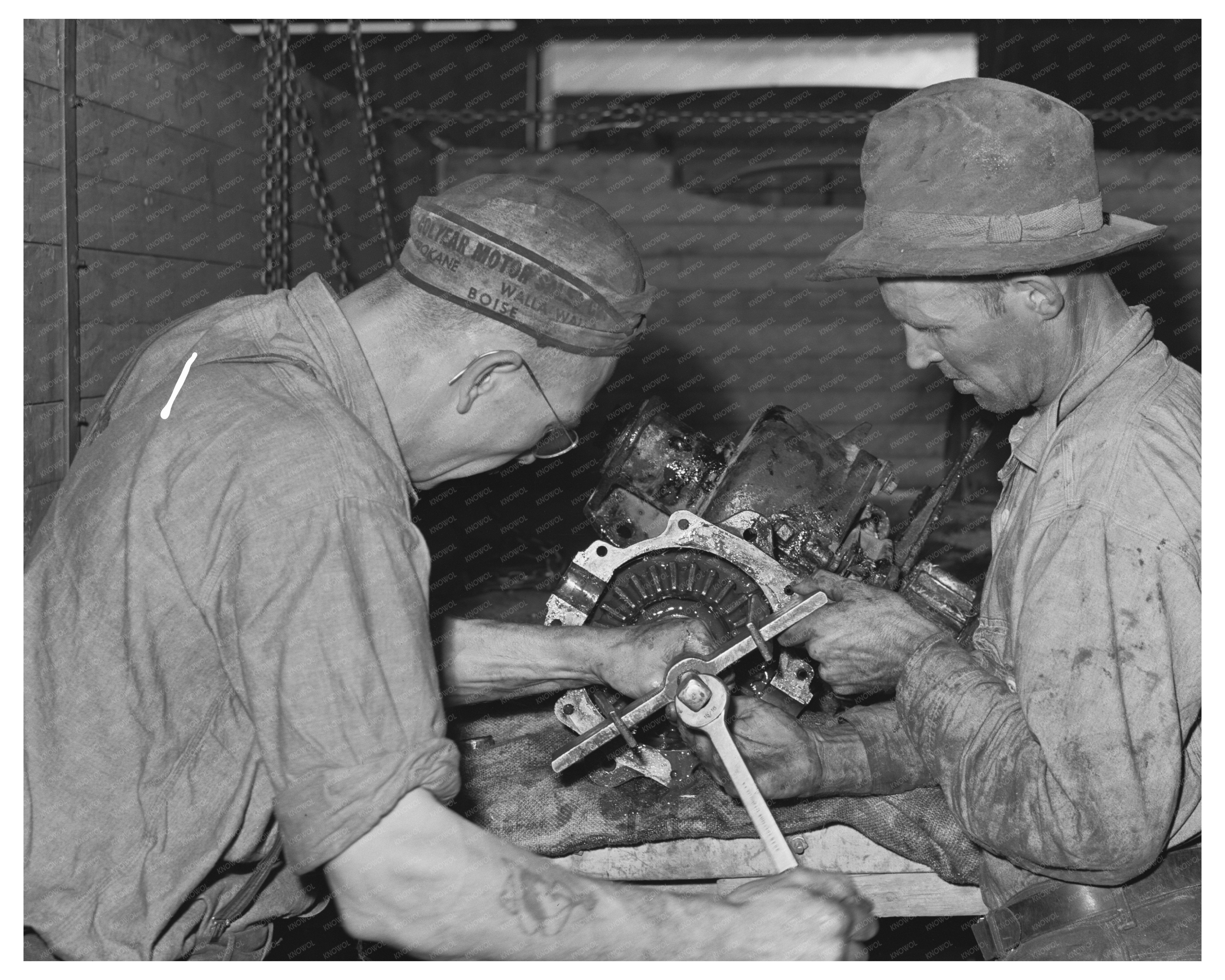 Farmer Repairs Tractor in Colfax Washington July 1941