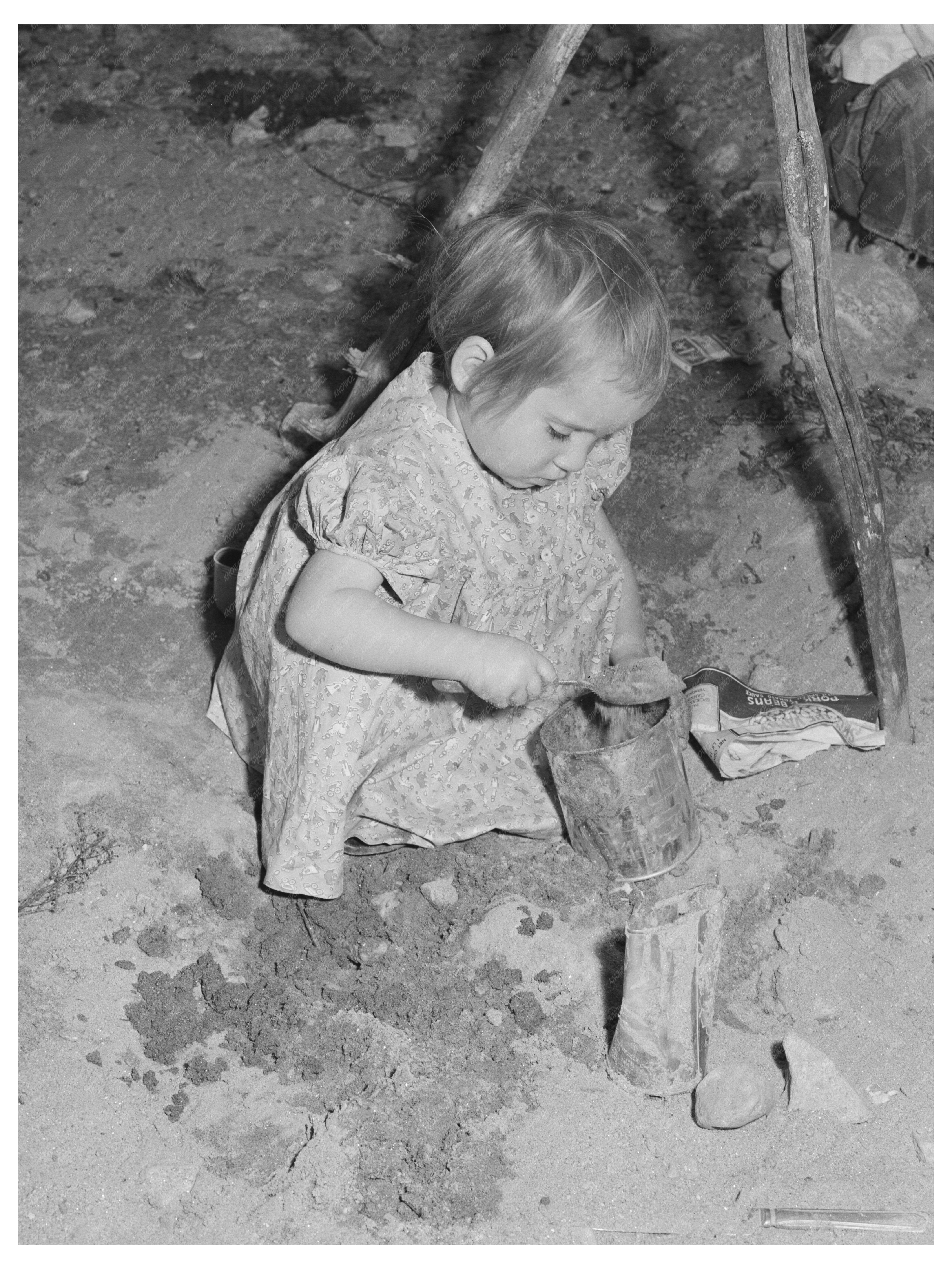 Young Girl Playing in Sandpile Yakima County 1941