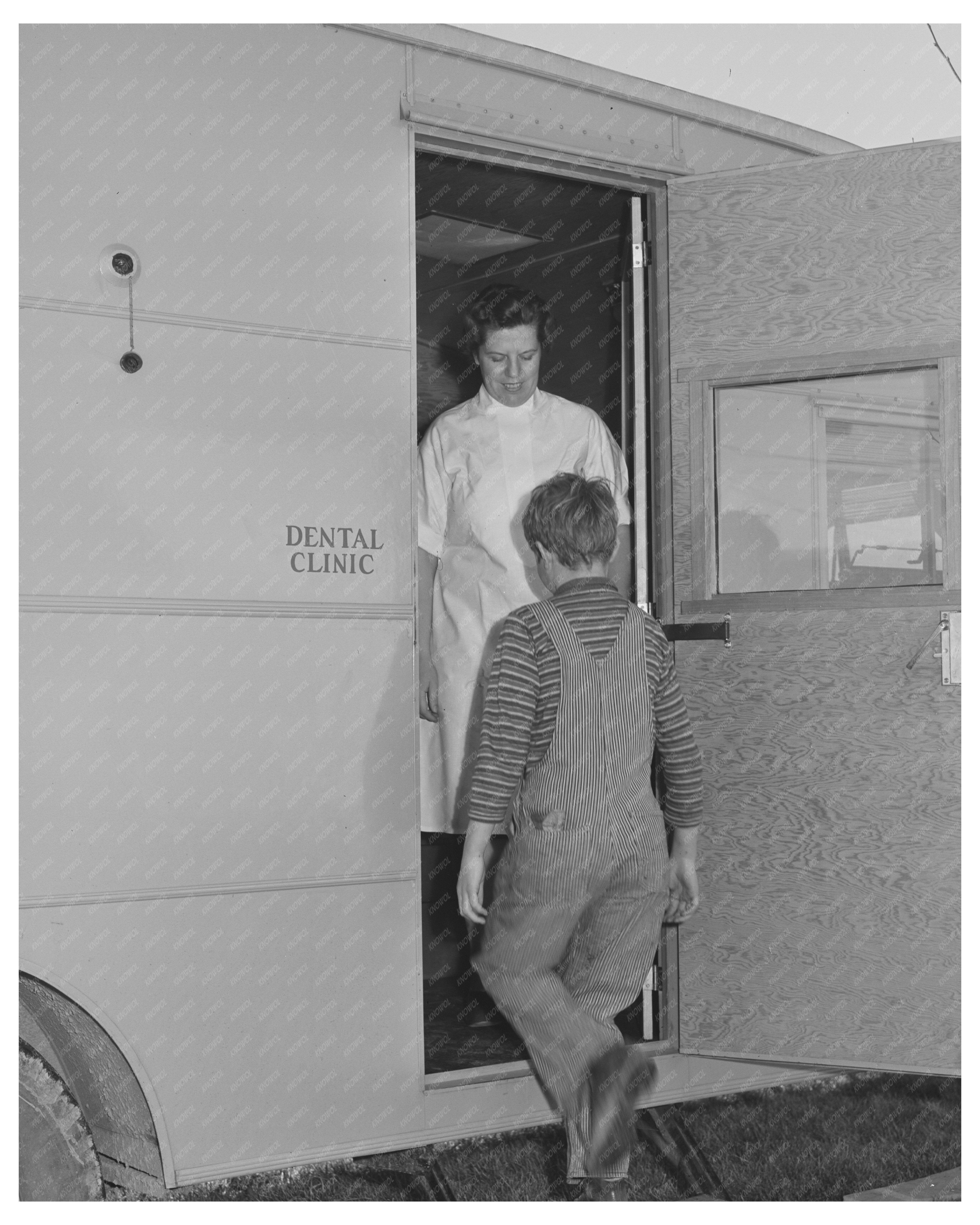 FSA Nurse Welcomes Migrant Boy Caldwell Idaho 1941