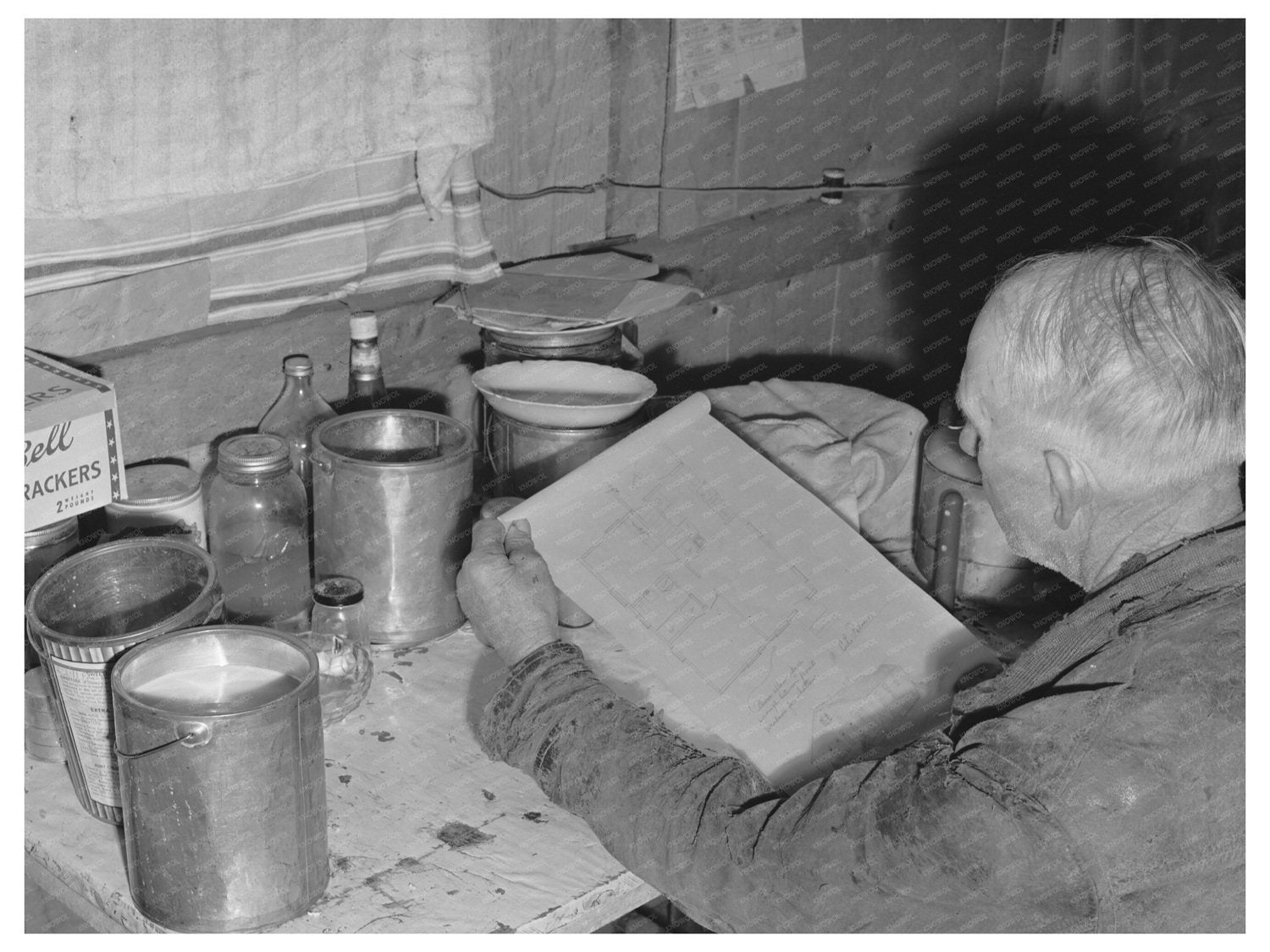 Mr. Palmer Reviews Home Plans Idaho December 1941