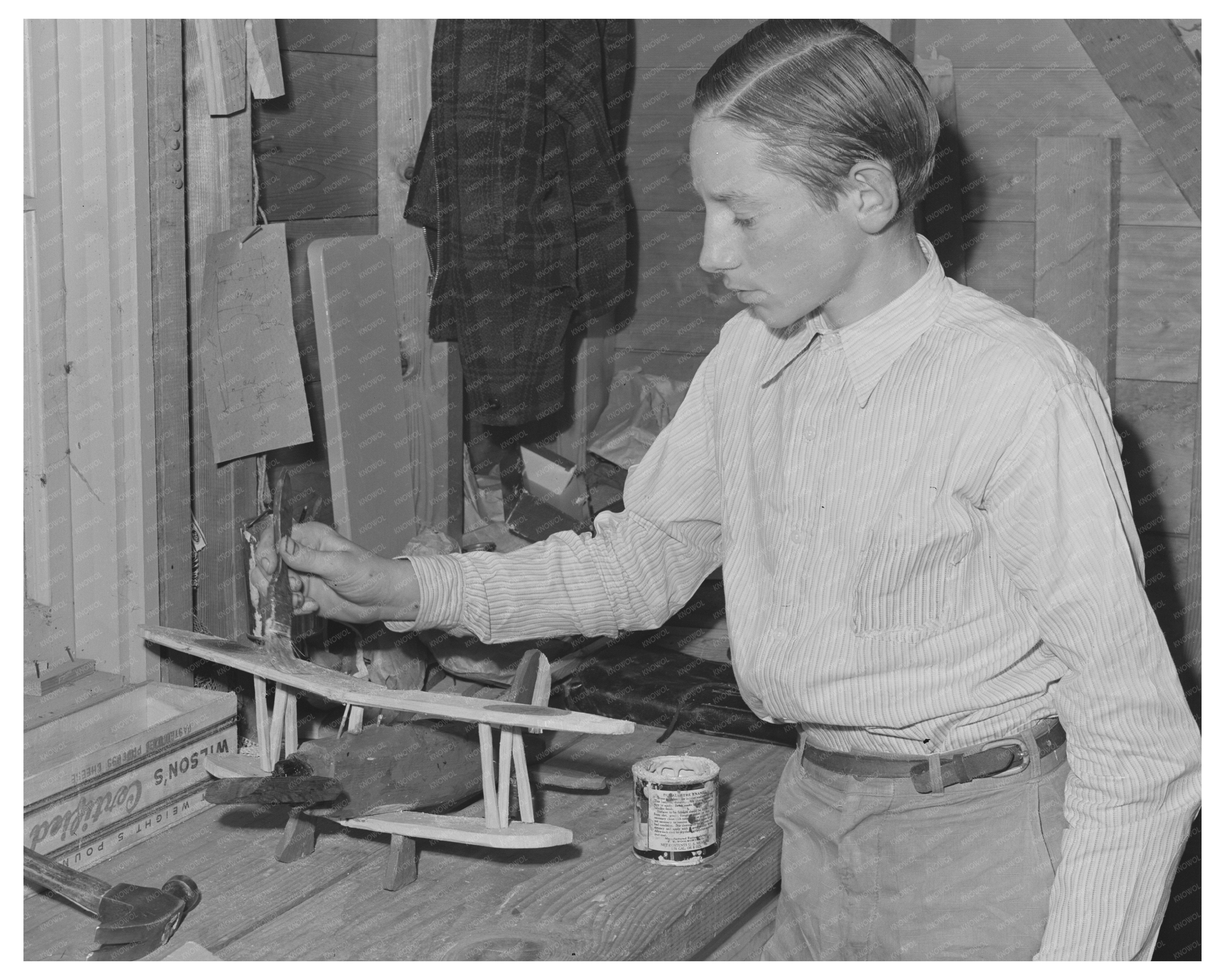 Young Boy Crafting Model Airplane Farm Camp 1942