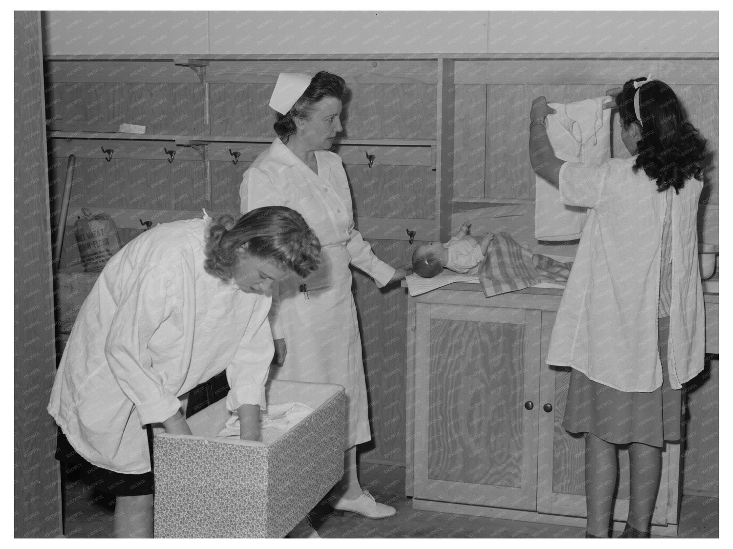 Girls Learning Baby Care Skills in Arizona February 1942