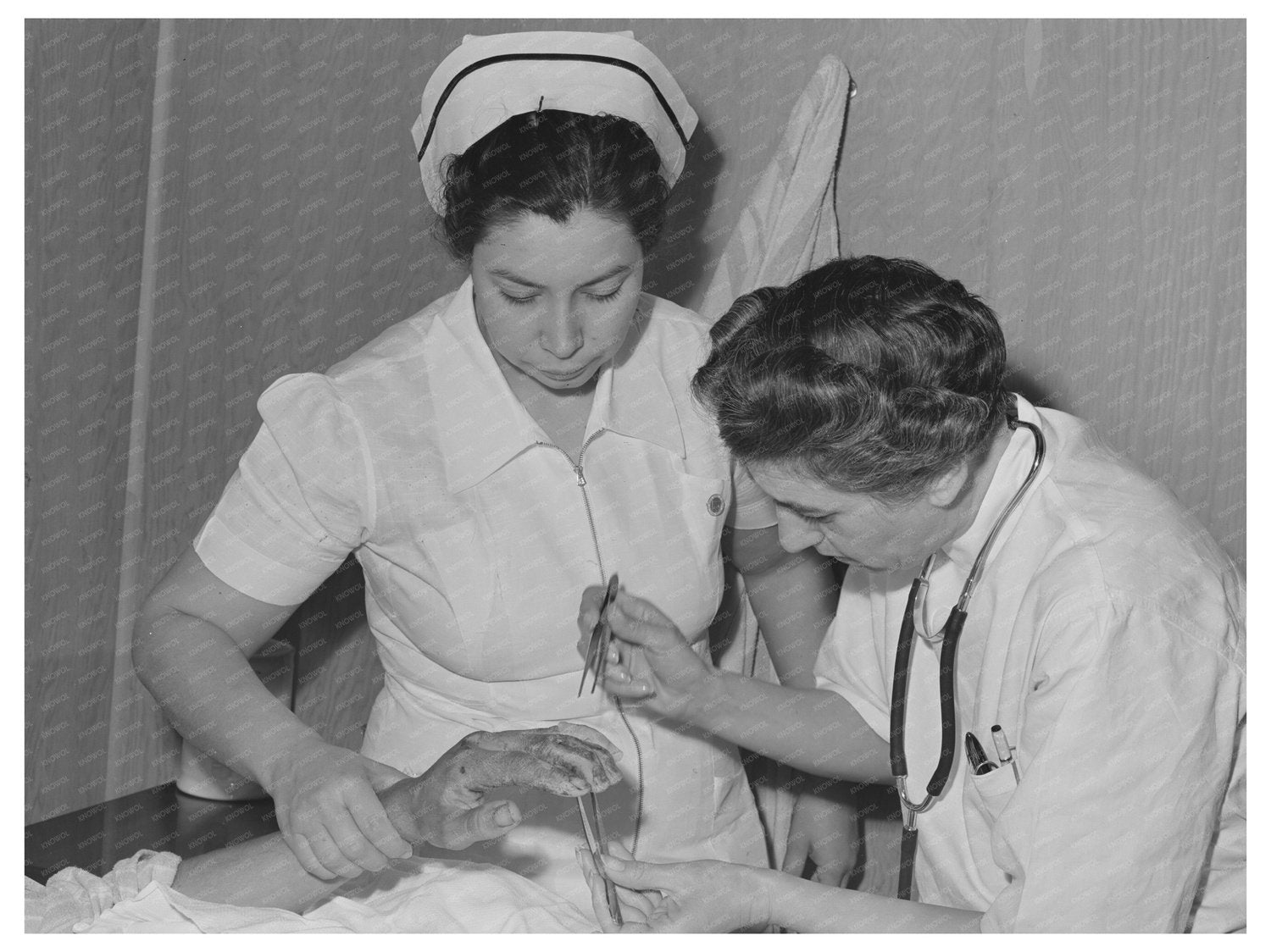 Resident Doctor Treats Burn Victim at Cairns Hospital 1942