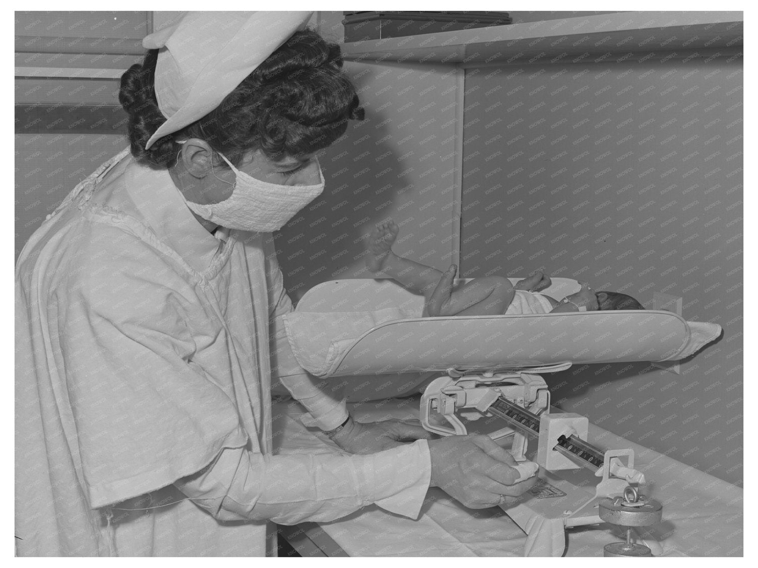 Nurse Weighing Newborn at Cairns General Hospital 1942