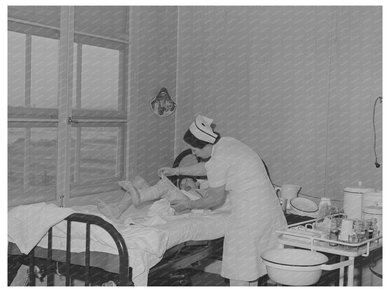 1942 Nurse Attending Patient at Cairns General Hospital