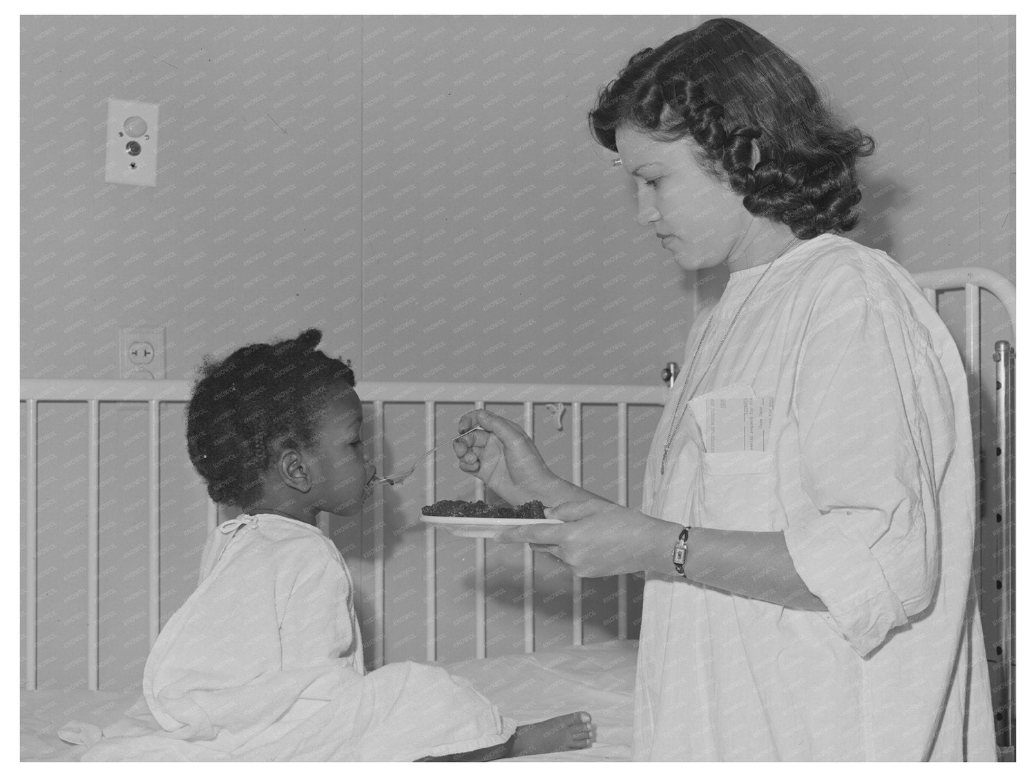 Girl Feeding Patient at Cairns General Hospital 1942
