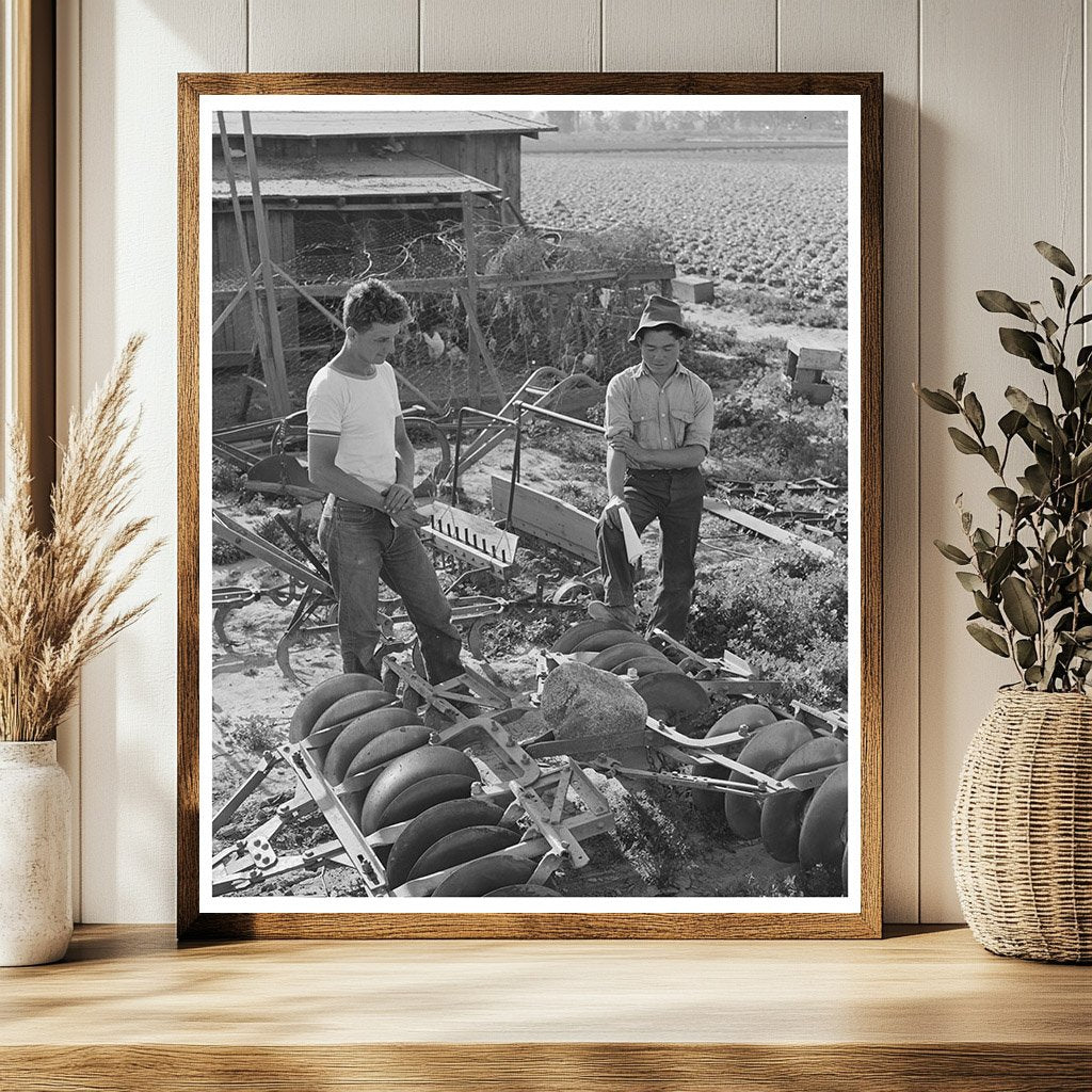 1942 Farmer Examines Equipment Amid Japanese Evacuation