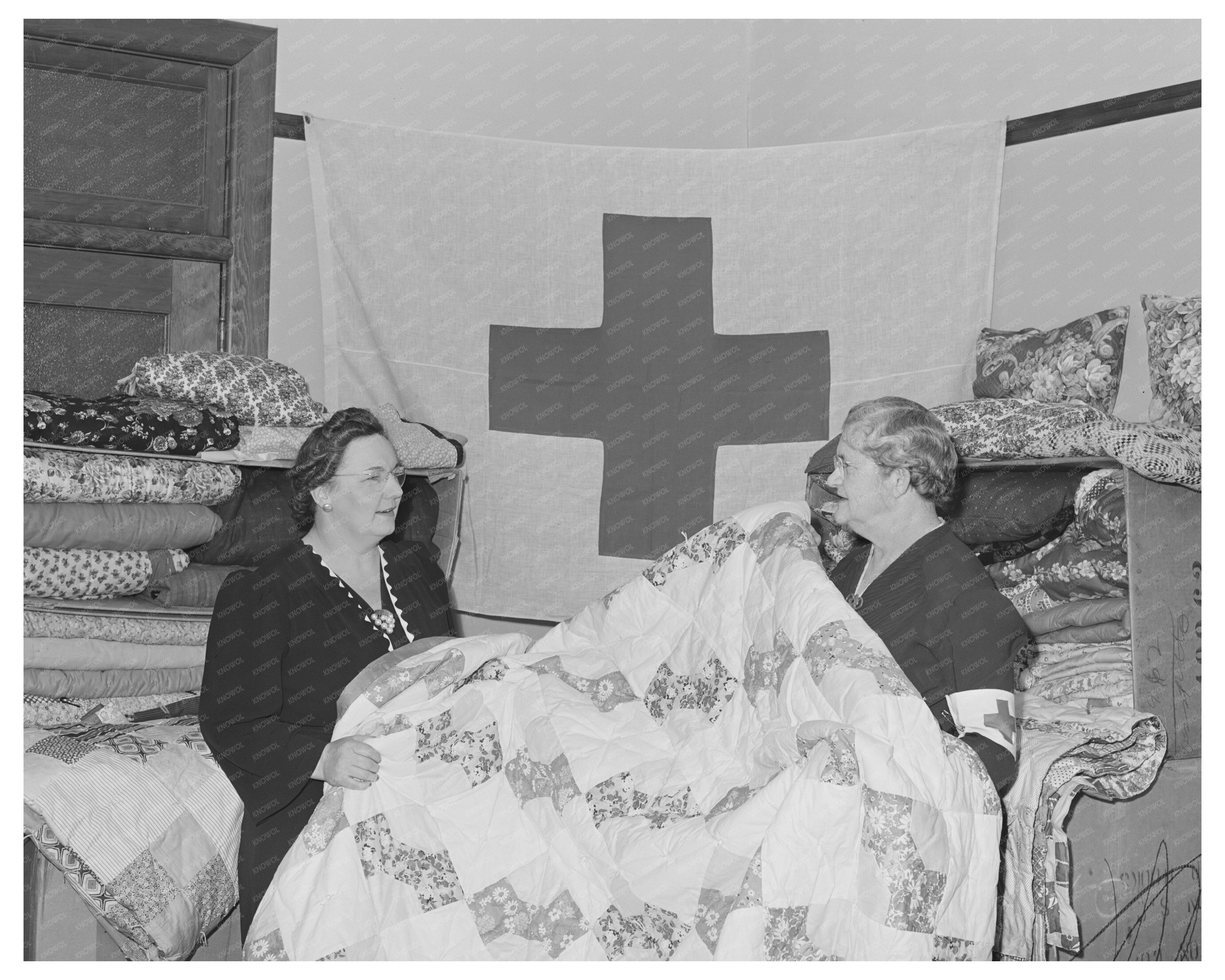 Housewife with Red Cross Quilts Turlock California May 1942