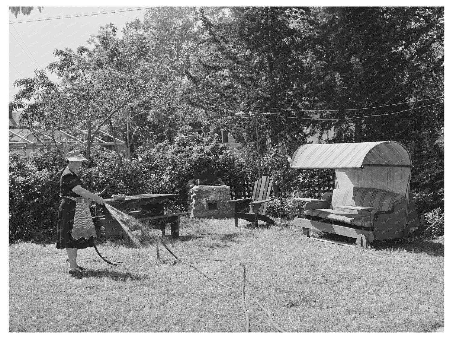 1942 Vintage Photo of Housewife Watering Lawn in Turlock