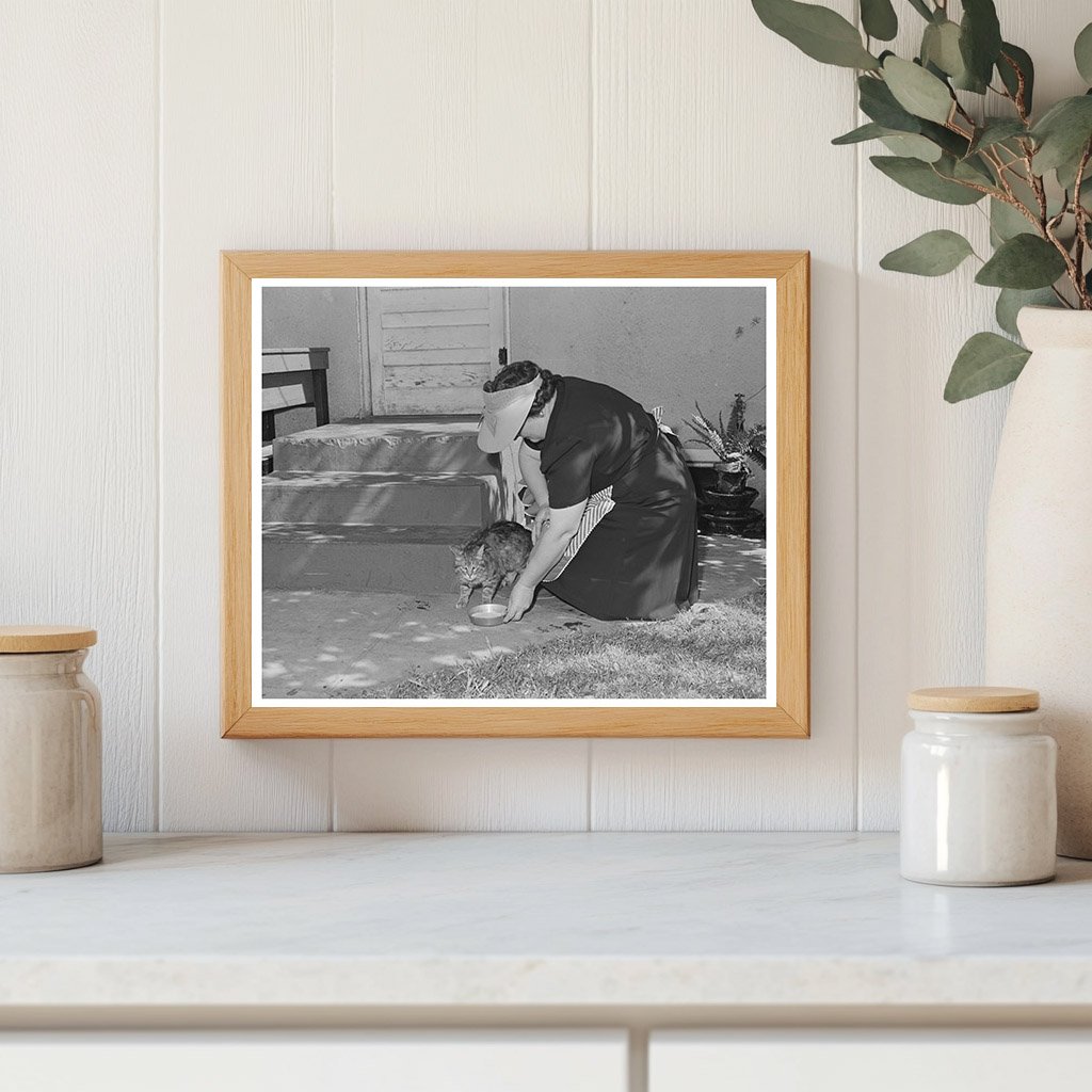 1942 Housewife Feeding Cat in Turlock California