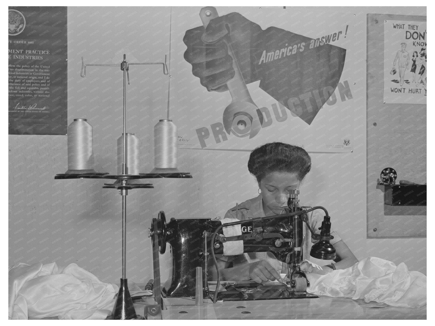 Hemming Pilot Parachute on Sewing Machine April 1942