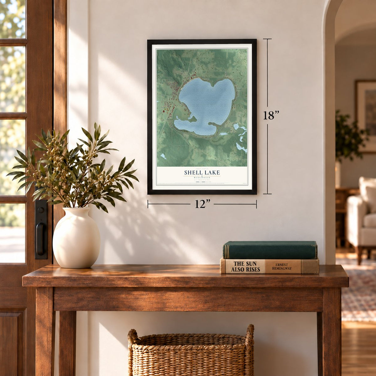 Shell Lake, Wisconsin map, 12 x 18 inch print in a black frame in an entryway