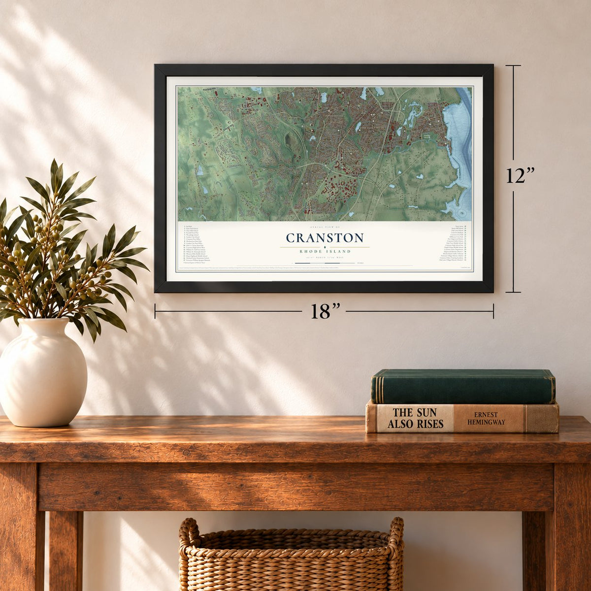 Cranston, Rhode Island map, 12 x 18 inch print in a black frame in an entryway