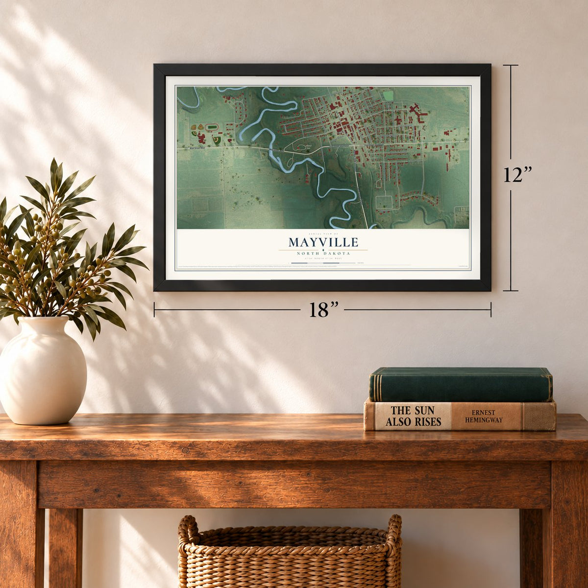 Mayville, North Dakota map, 12 x 18 inch print in a black frame in an entryway