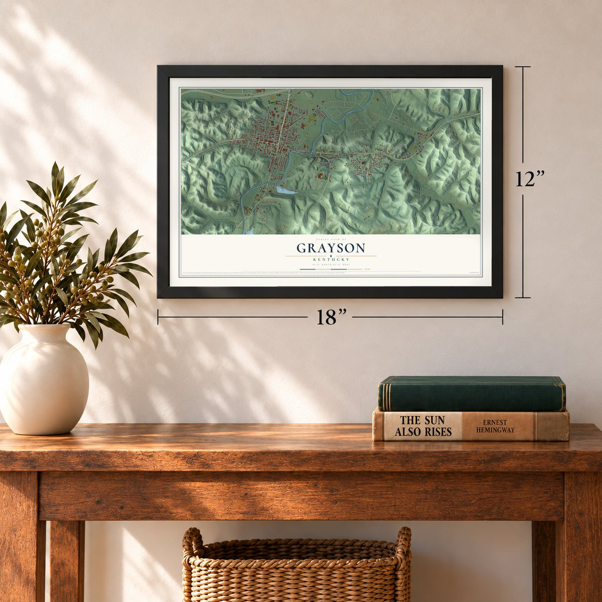 Grayson, Kentucky map, 12 x 18 inch print in a black frame in an entryway