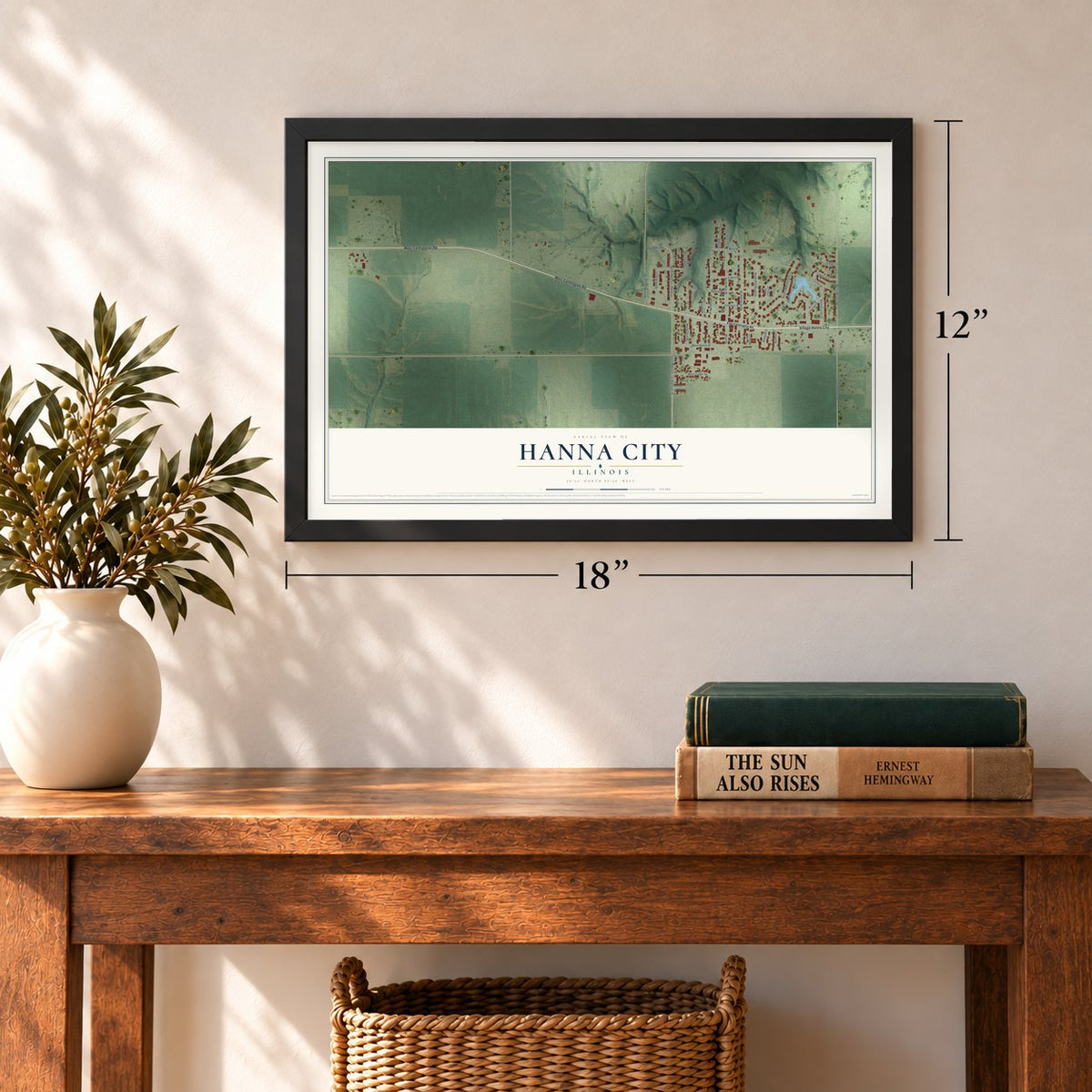Hanna City, Illinois map, 12 x 18 inch print in a black frame in an entryway