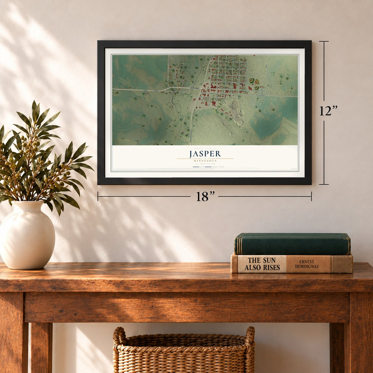 Jasper, Minnesota map, 12 x 18 inch print in a black frame in an entryway