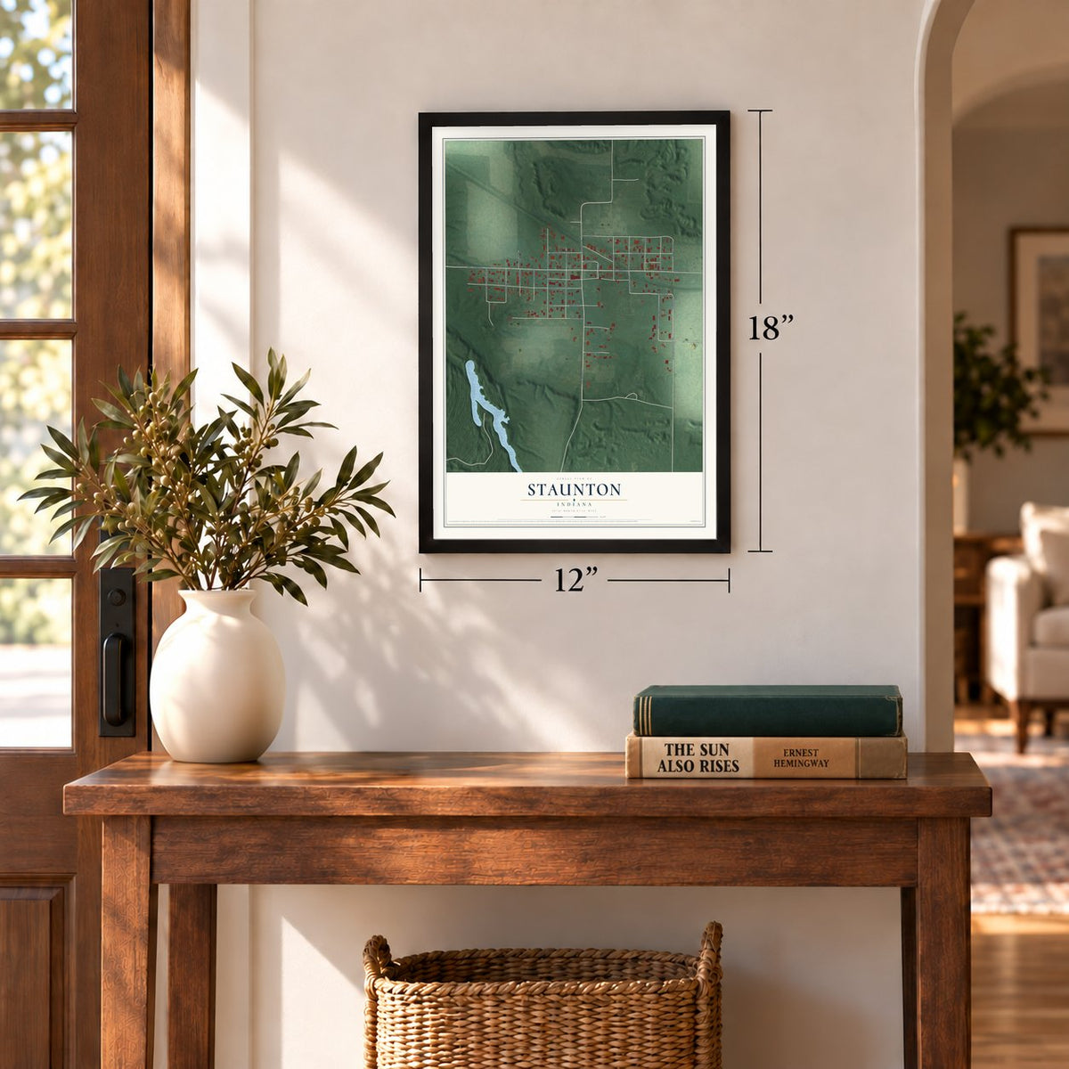 Staunton, Indiana map, 12 x 18 inch print in a black frame in an entryway