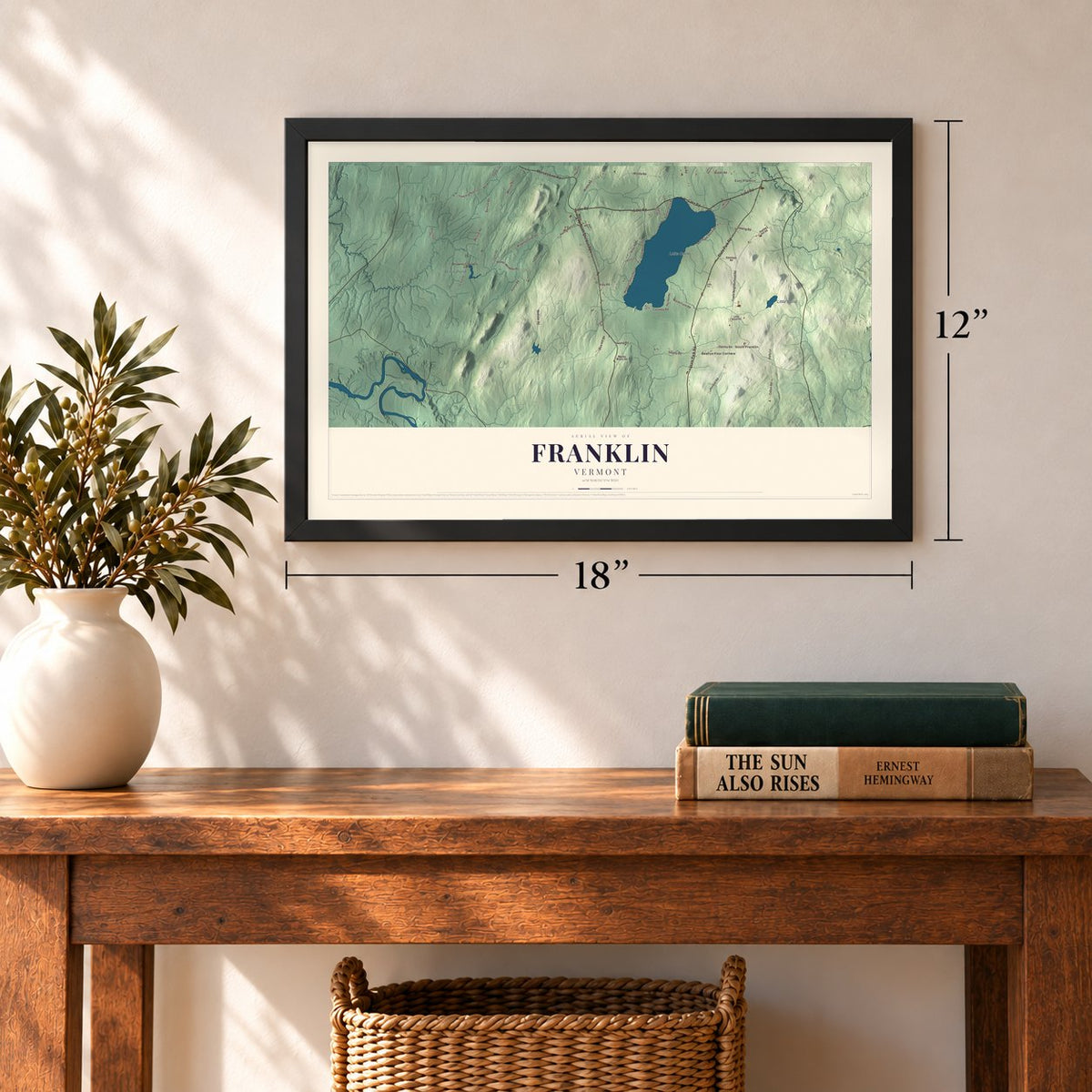 Franklin, Vermont map, 12 x 18 inch print in a black frame in an entryway