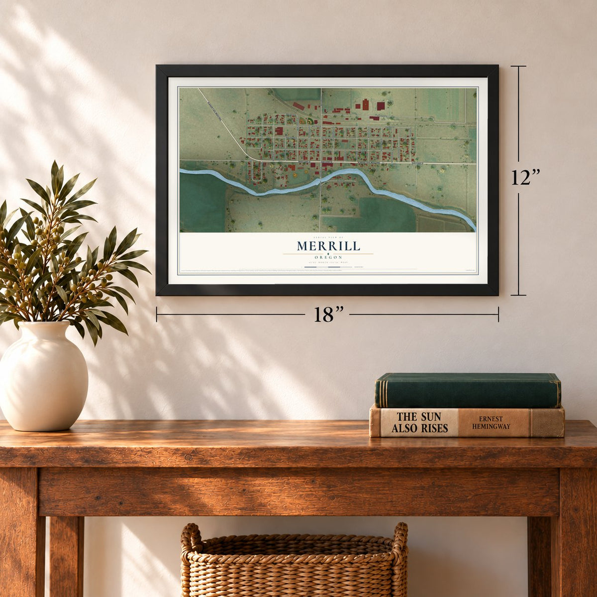 Merrill, Oregon map, 12 x 18 inch print in a black frame in an entryway