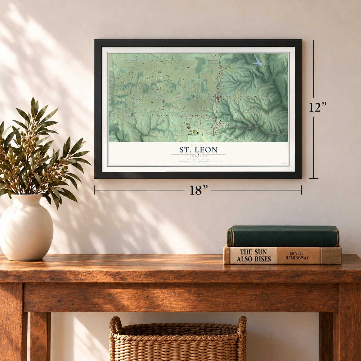 St. Leon, Indiana map, 12 x 18 inch print in a black frame in an entryway