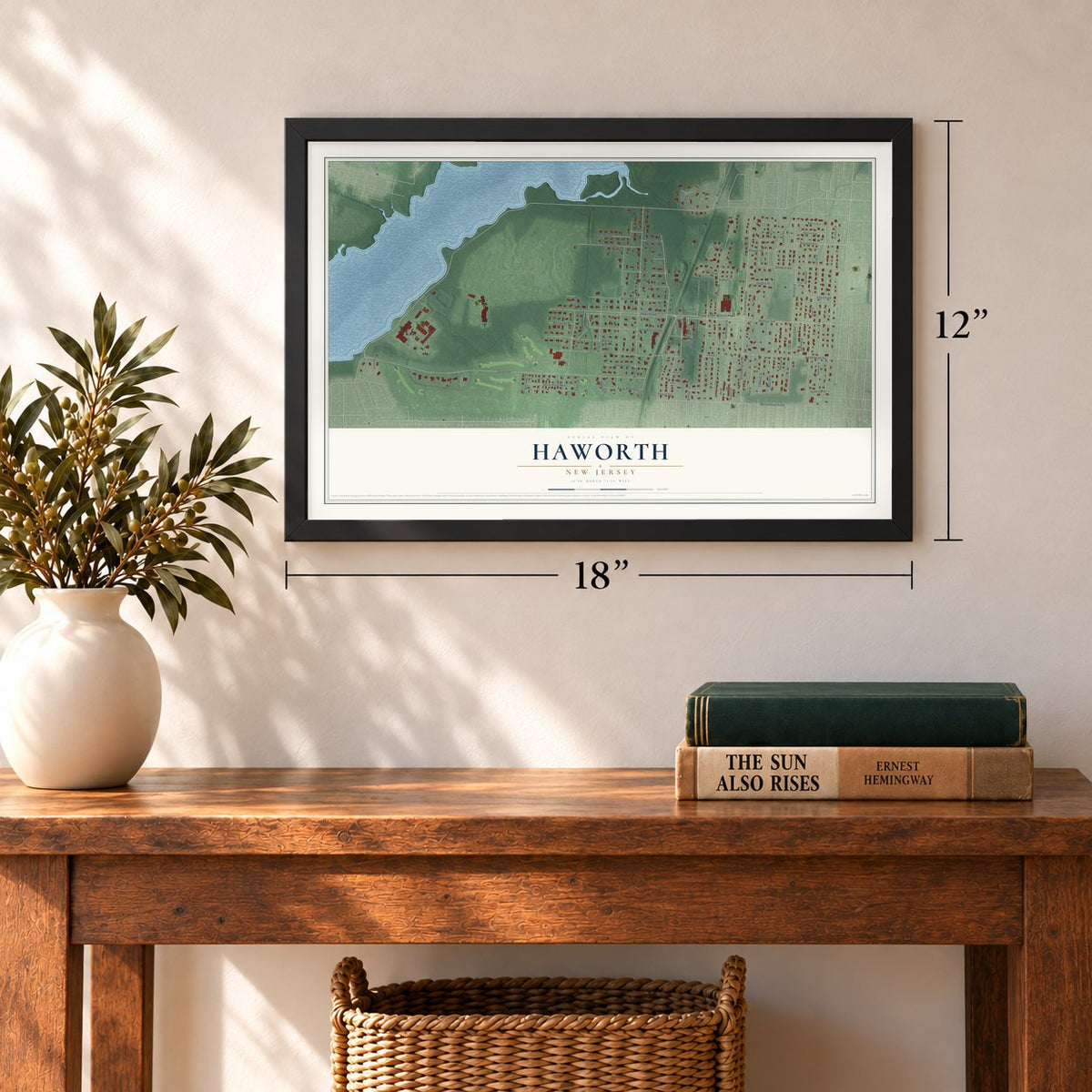 Haworth, New Jersey map, 12 x 18 inch print in a black frame in an entryway