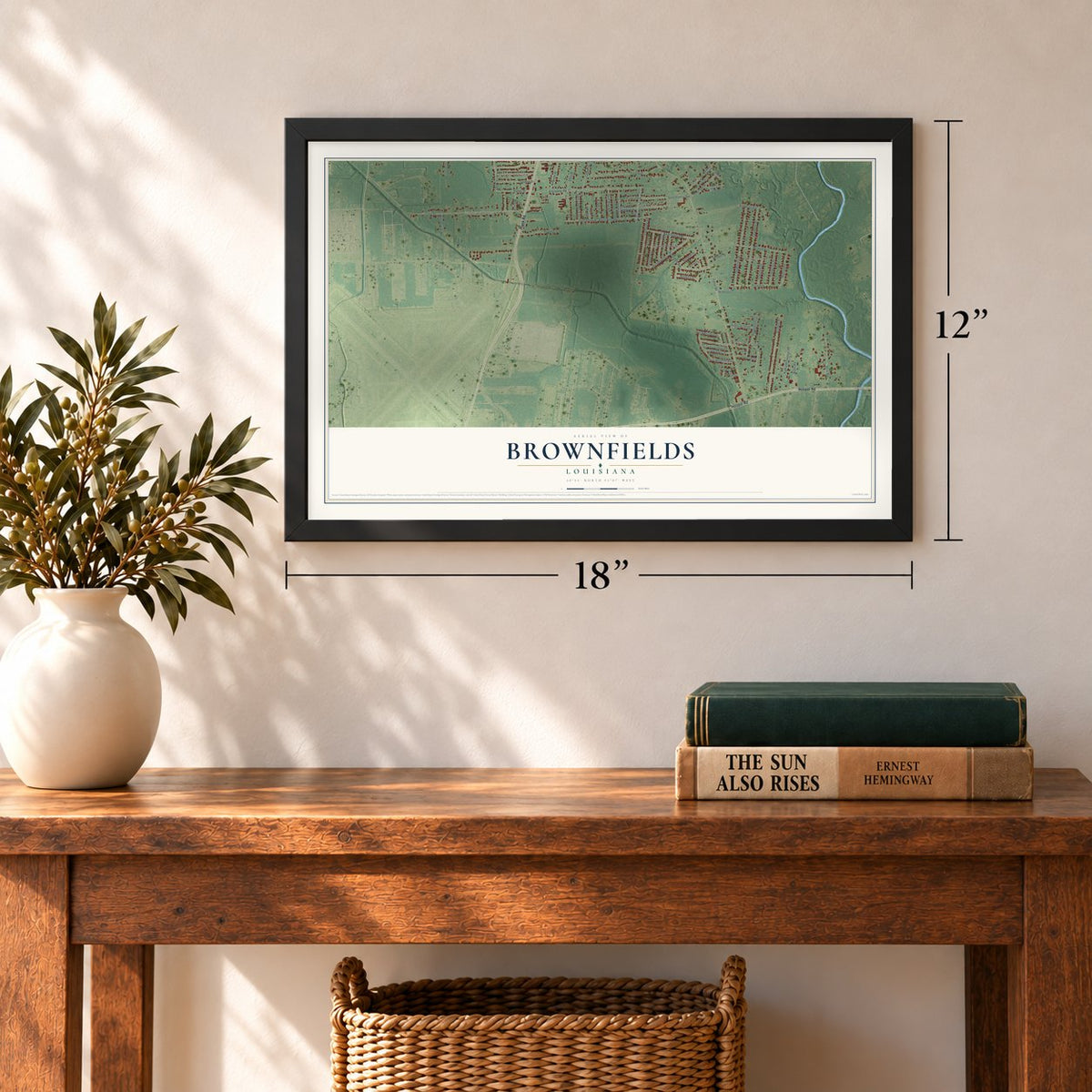 Brownfields, Louisiana map, 12 x 18 inch print in a black frame in an entryway