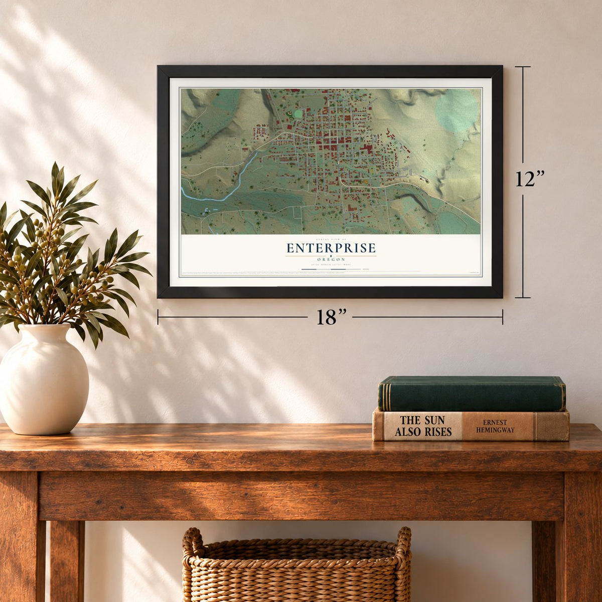 Enterprise, Oregon map, 12 x 18 inch print in a black frame in an entryway