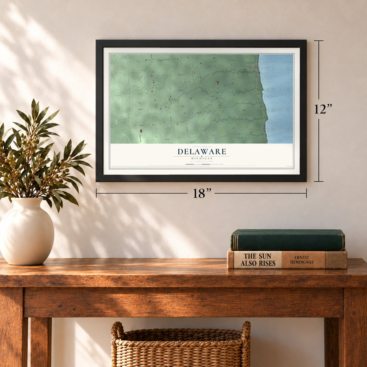 Delaware, Michigan map, 12 x 18 inch print in a black frame in an entryway