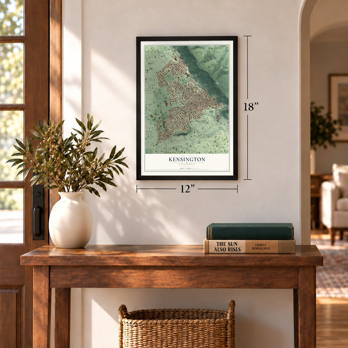 Kensington, California map, 12 x 18 inch print in a black frame in an entryway