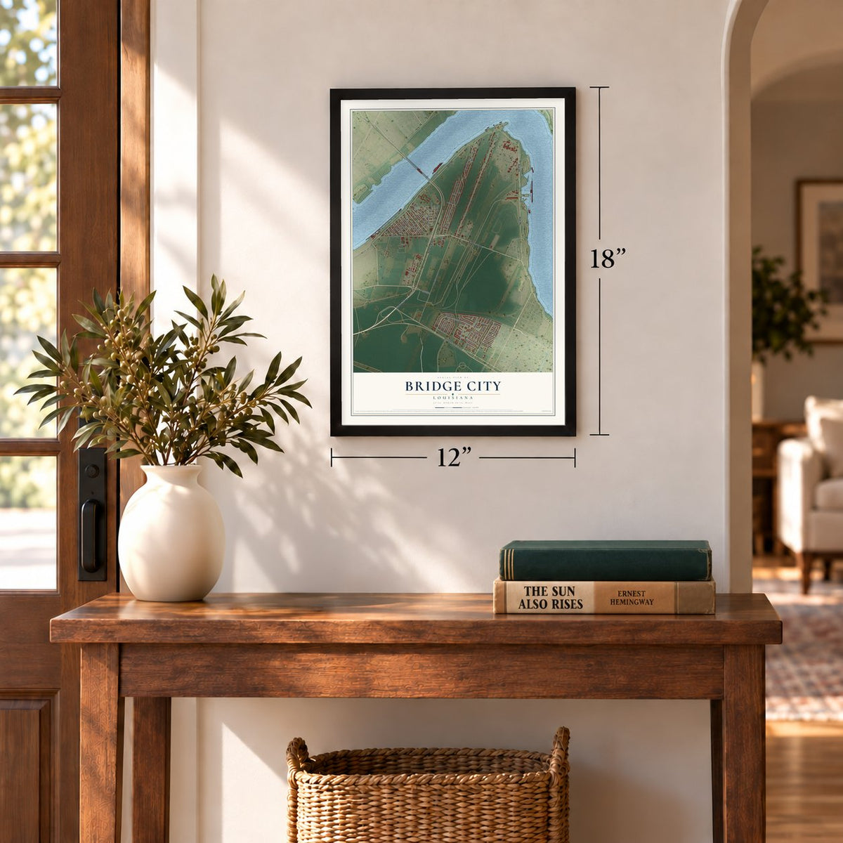 Bridge City, Louisiana map, 12 x 18 inch print in a black frame in an entryway