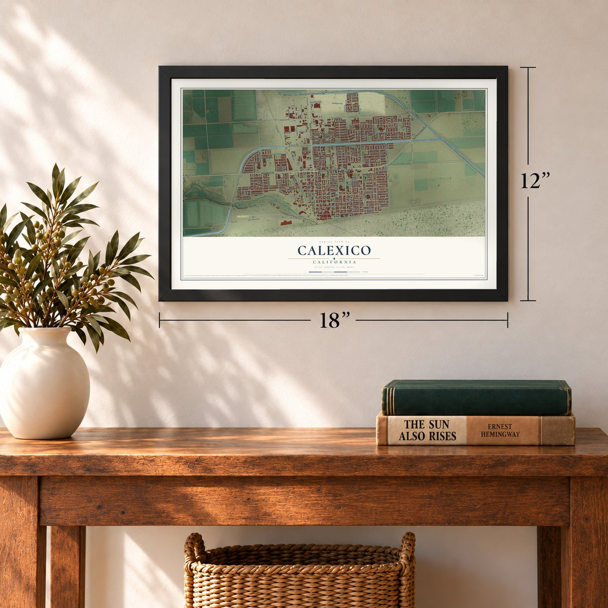 Calexico, California map, 12 x 18 inch print in a black frame in an entryway