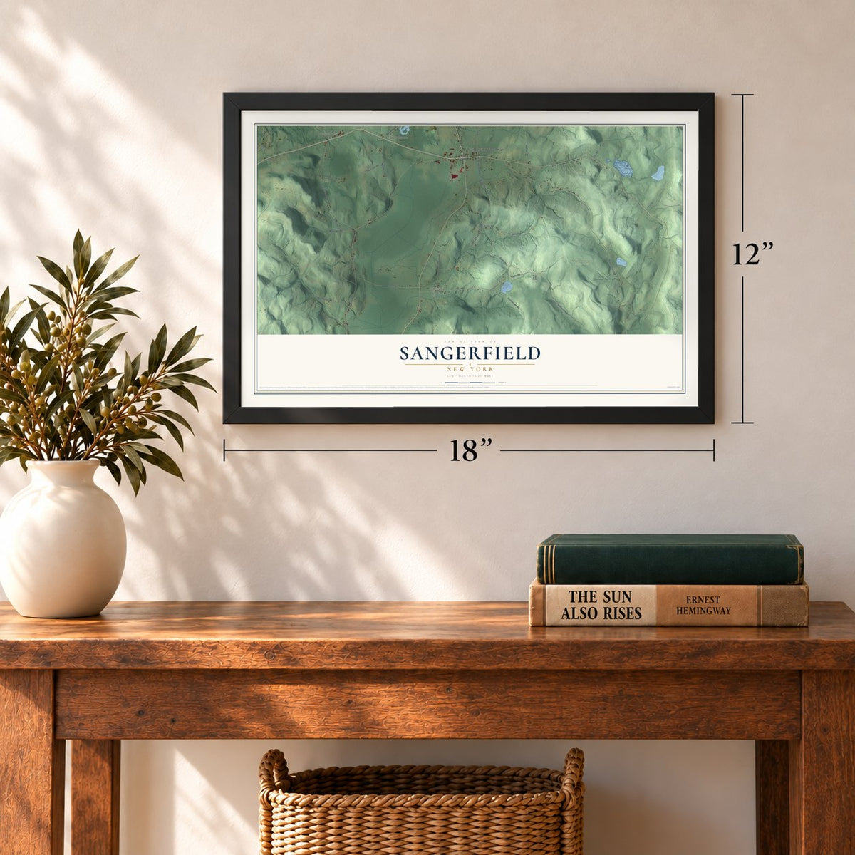 Sangerfield, New York map, 12 x 18 inch print in a black frame in an entryway