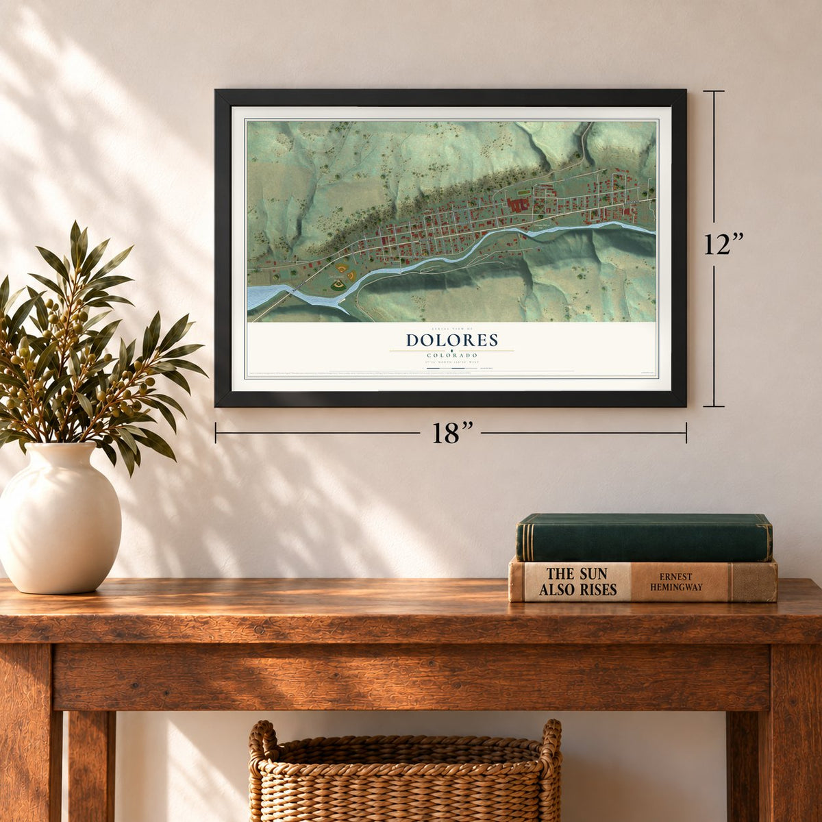 Dolores, Colorado map, 12 x 18 inch print in a black frame in an entryway