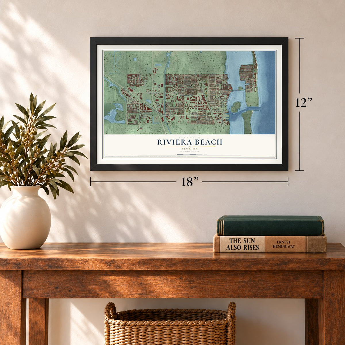 Riviera Beach, Florida map, 12 x 18 inch print in a black frame in an entryway