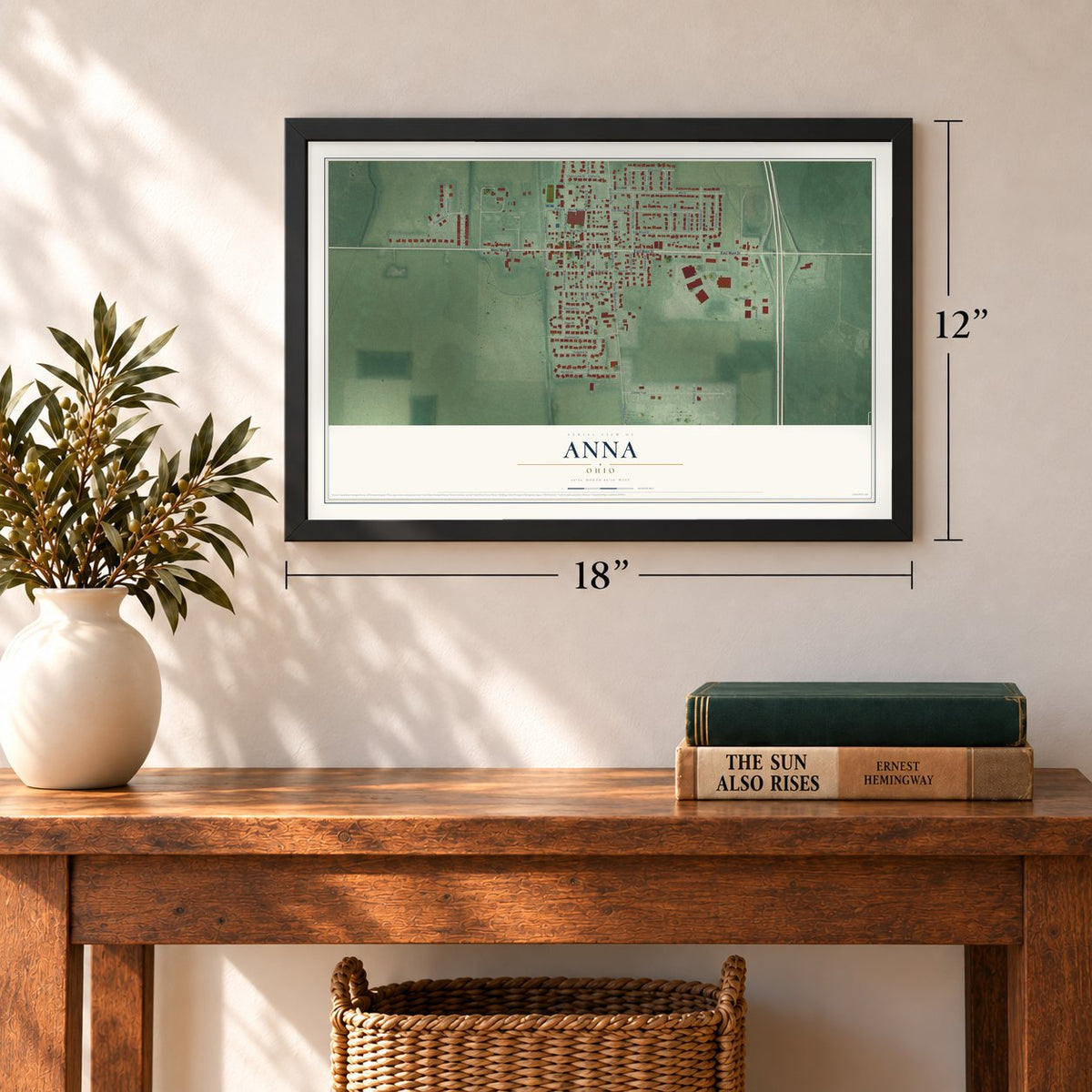 Anna, Ohio map, 12 x 18 inch print in a black frame in an entryway